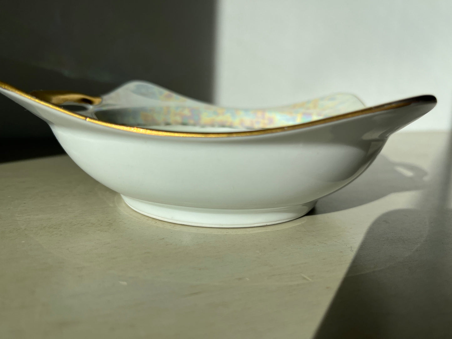 Antique porcelain hand painted dish with gold painted handles