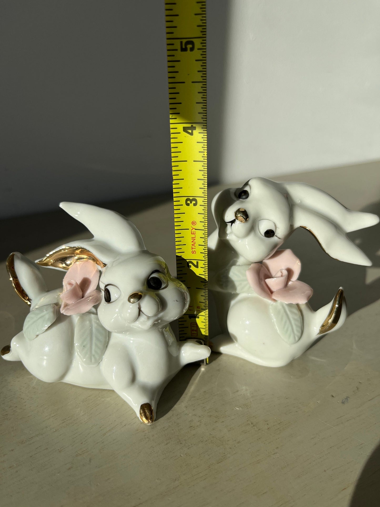 Vintage pair of white porcelain bunny rabbits, pink flowers & gold trim