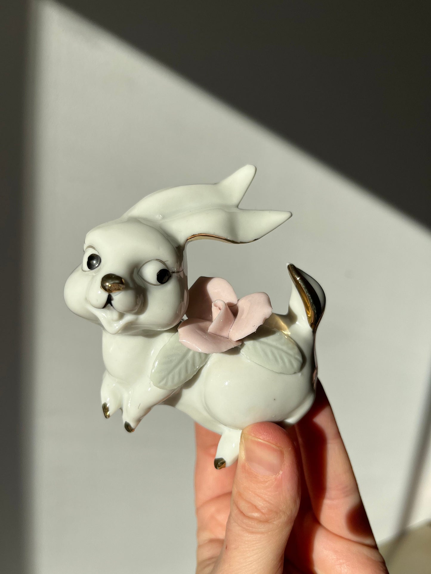Vintage pair of white porcelain bunny rabbits, pink flowers & gold trim