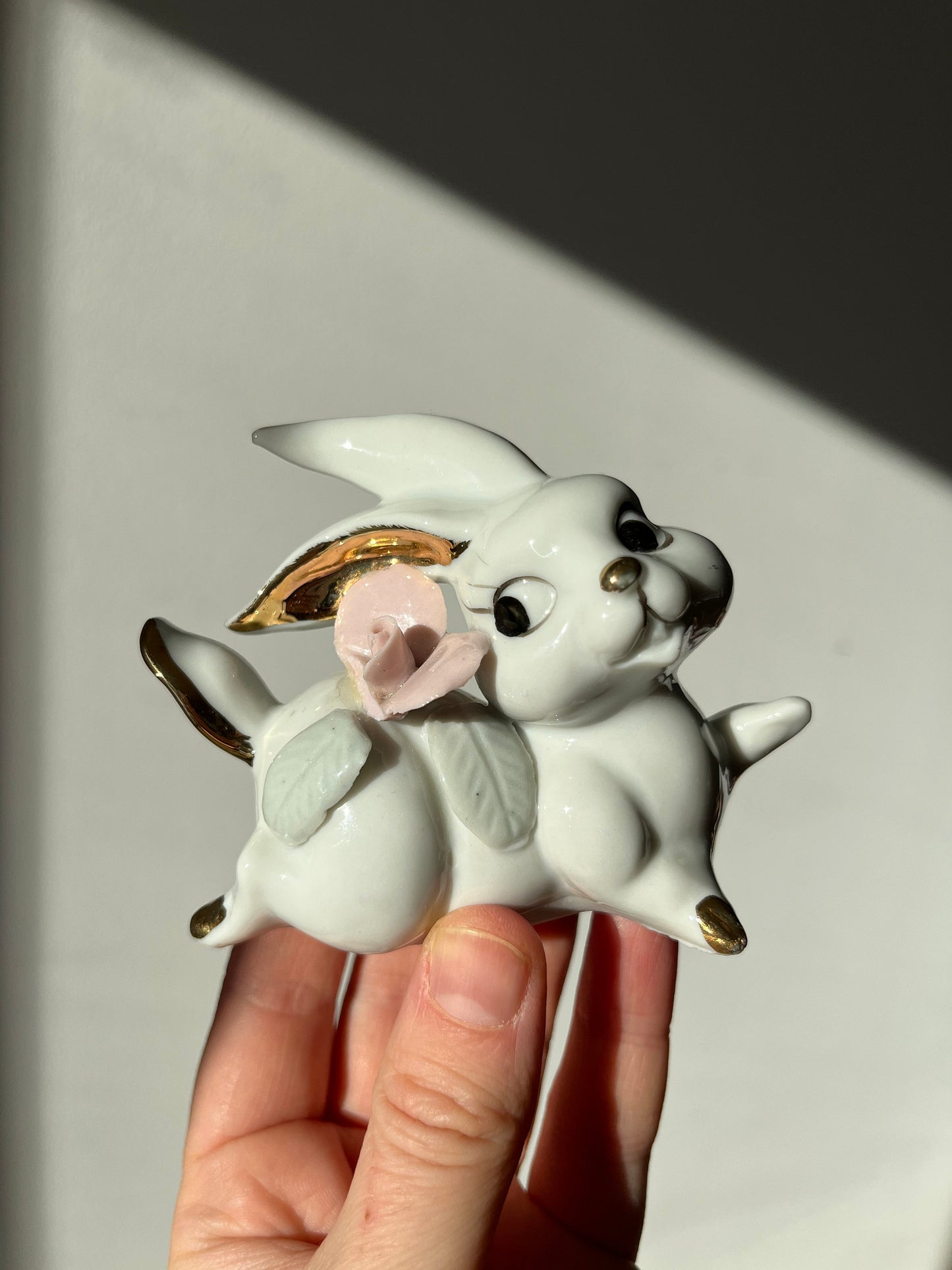 Vintage pair of white porcelain bunny rabbits, pink flowers & gold trim