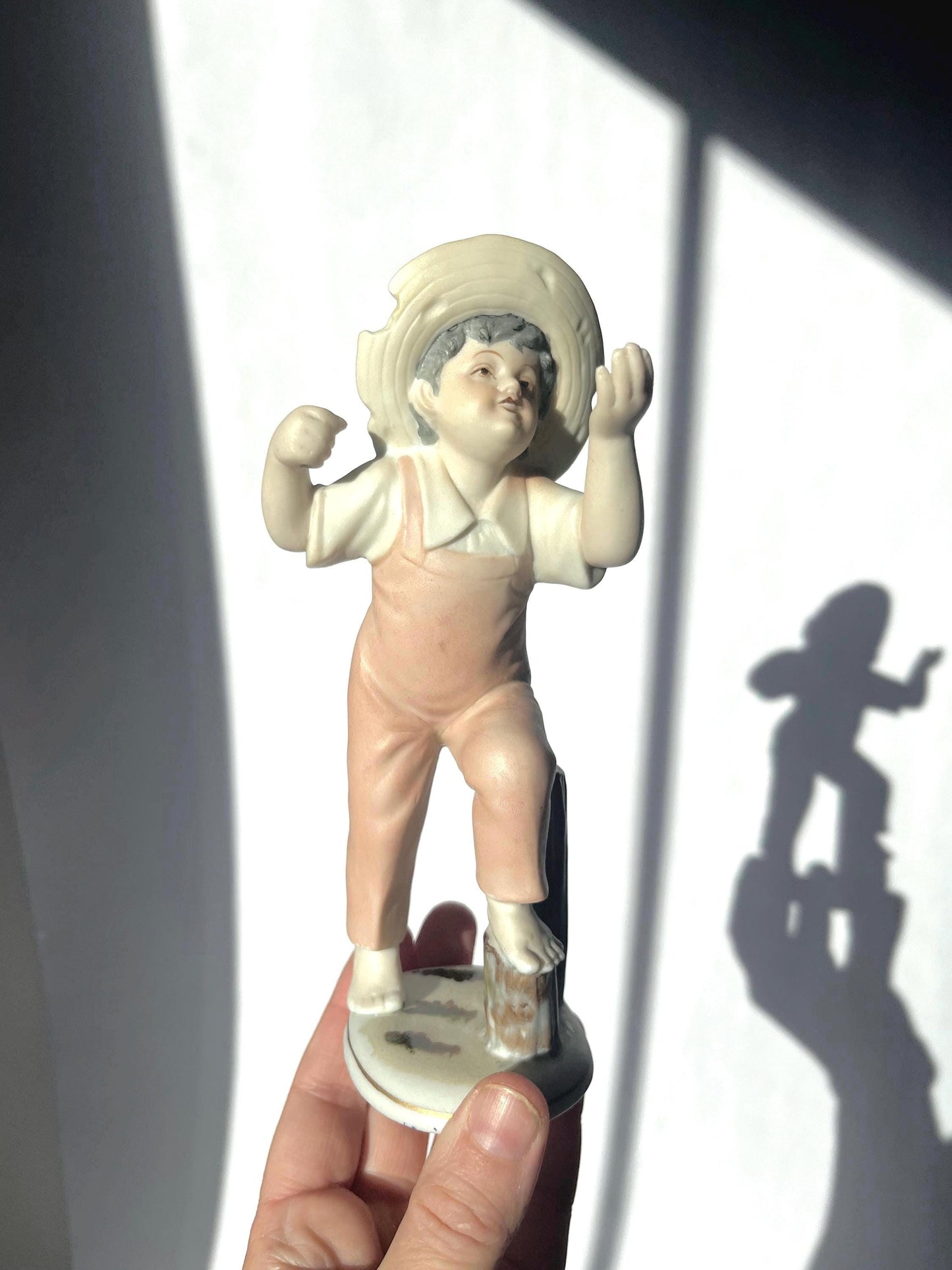 Vintage ceramic figurine of a boy, made in Japan