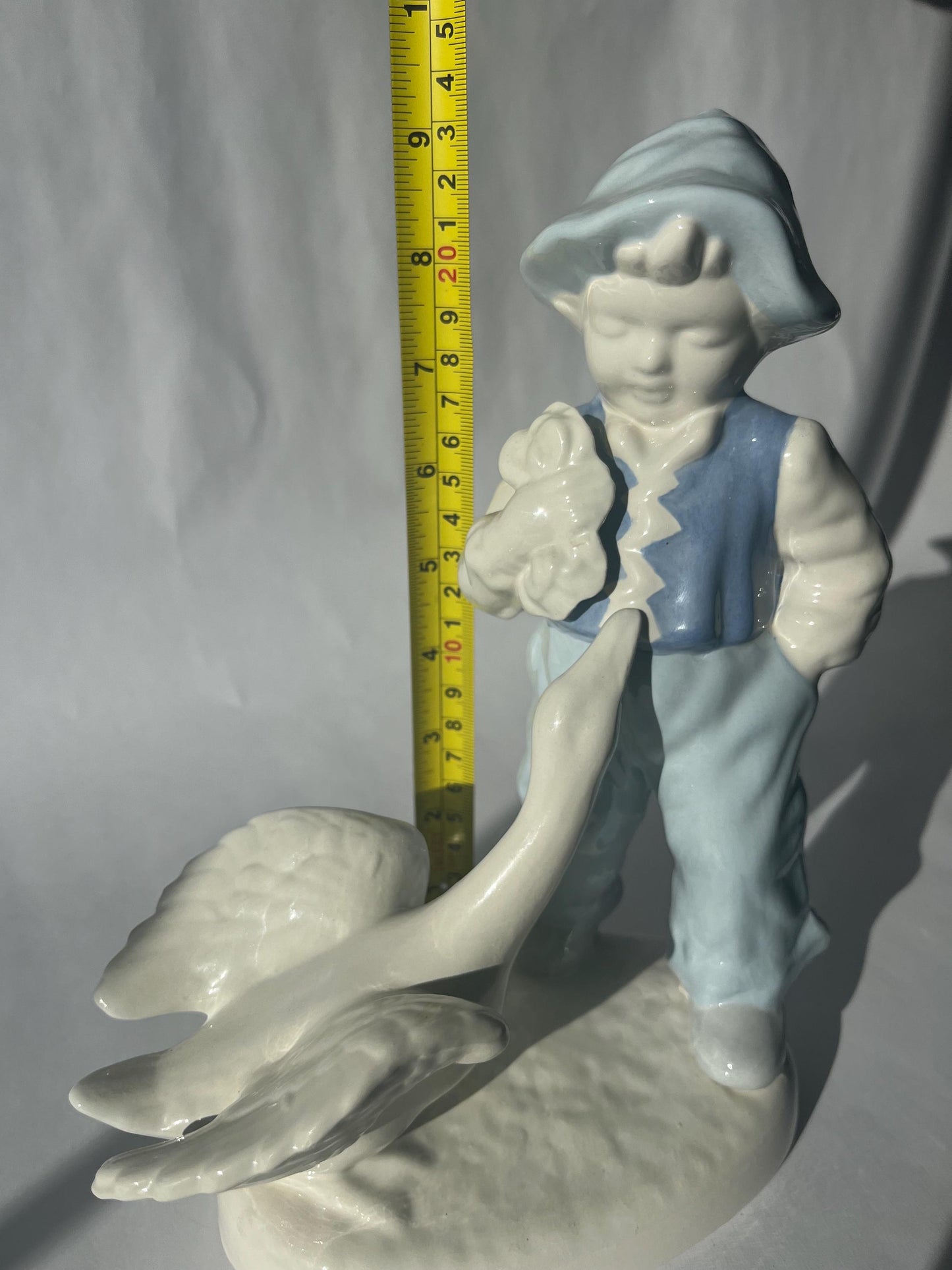 Vintage Porcelain Hand Painted Figurine of a Boy with a Goose