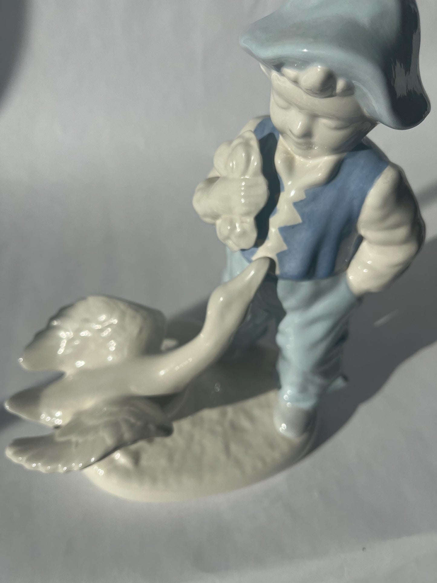 Vintage Porcelain Hand Painted Figurine of a Boy with a Goose