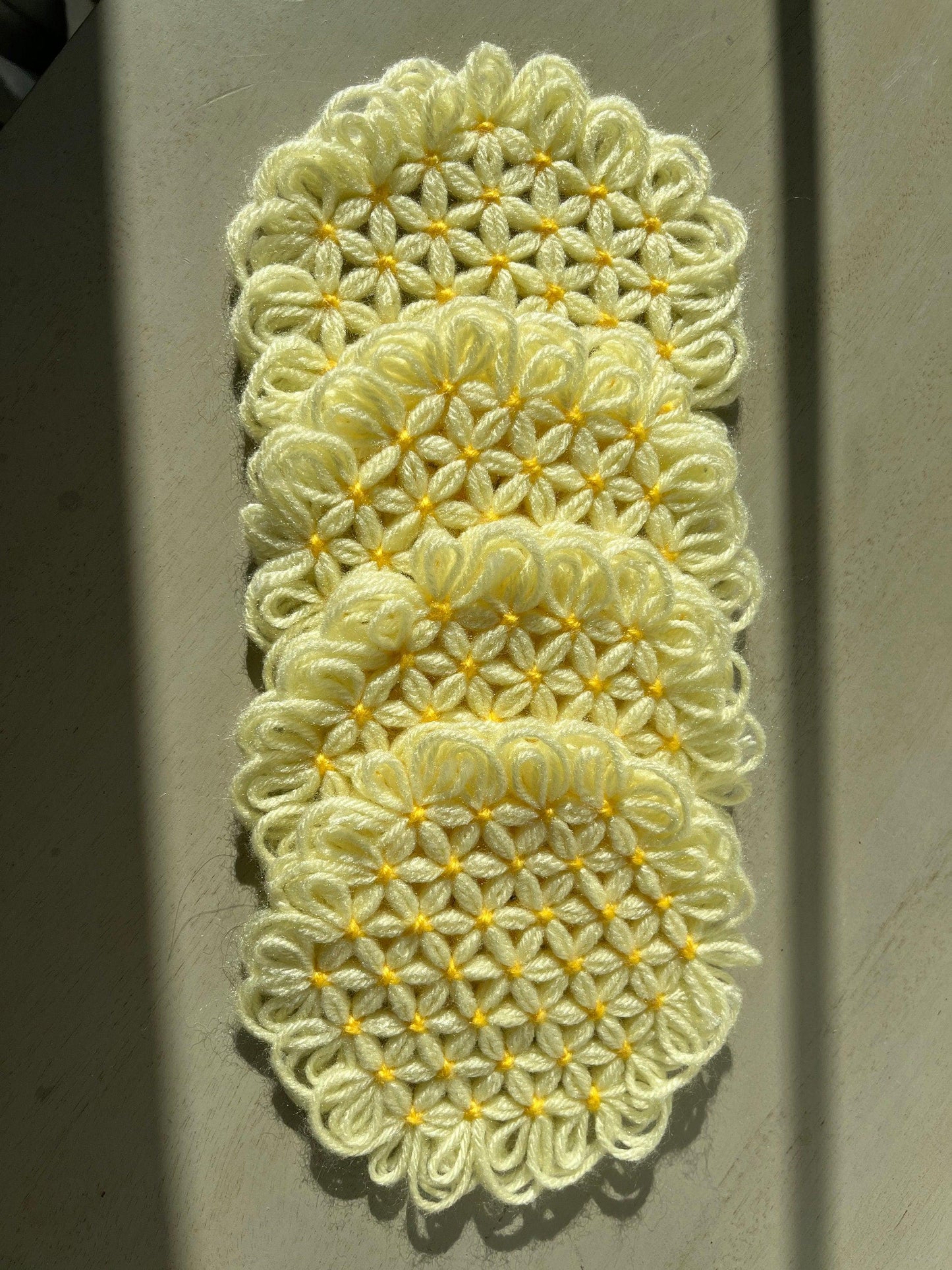 Vintage yellow crocheted coasters