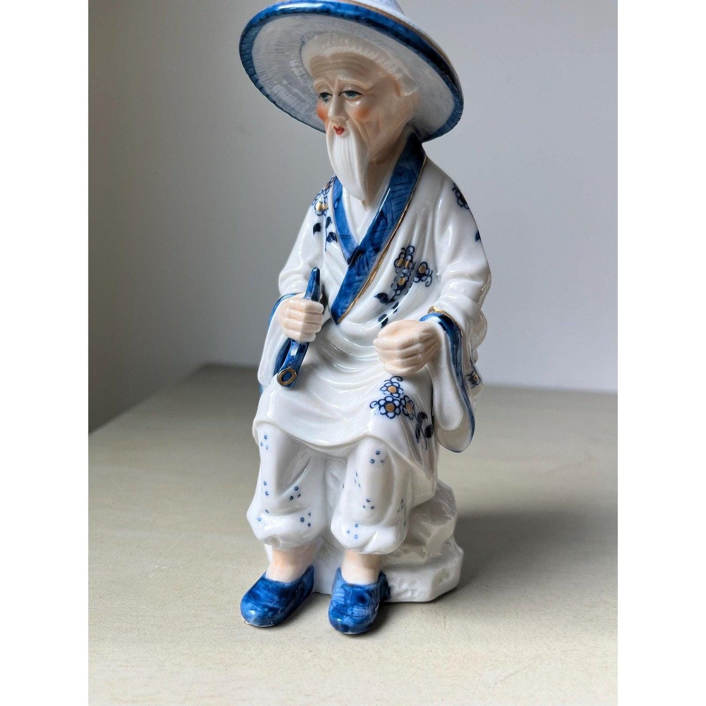 Pair of vintage porcelain Japanese musician figurines