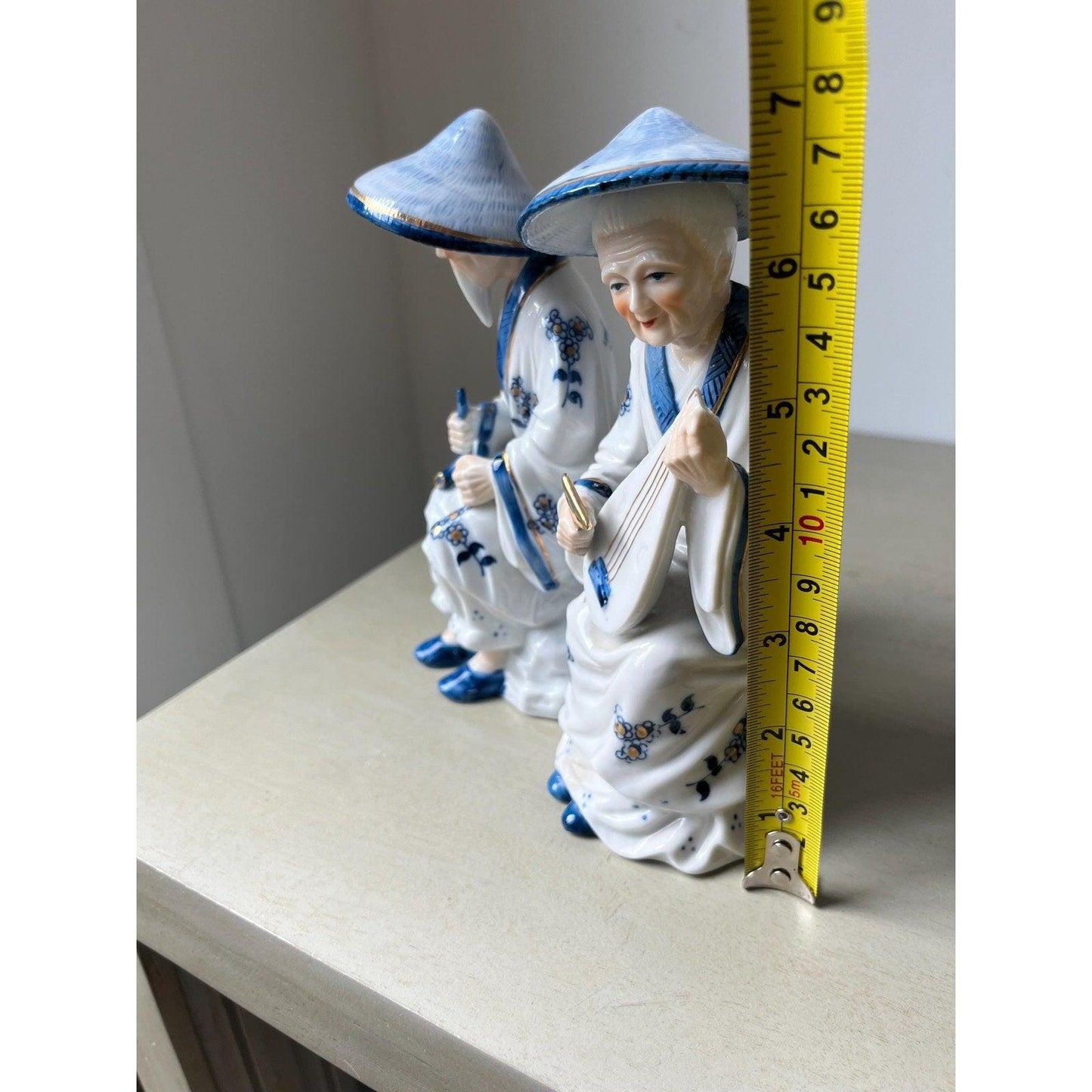 Pair of vintage porcelain Japanese musician figurines