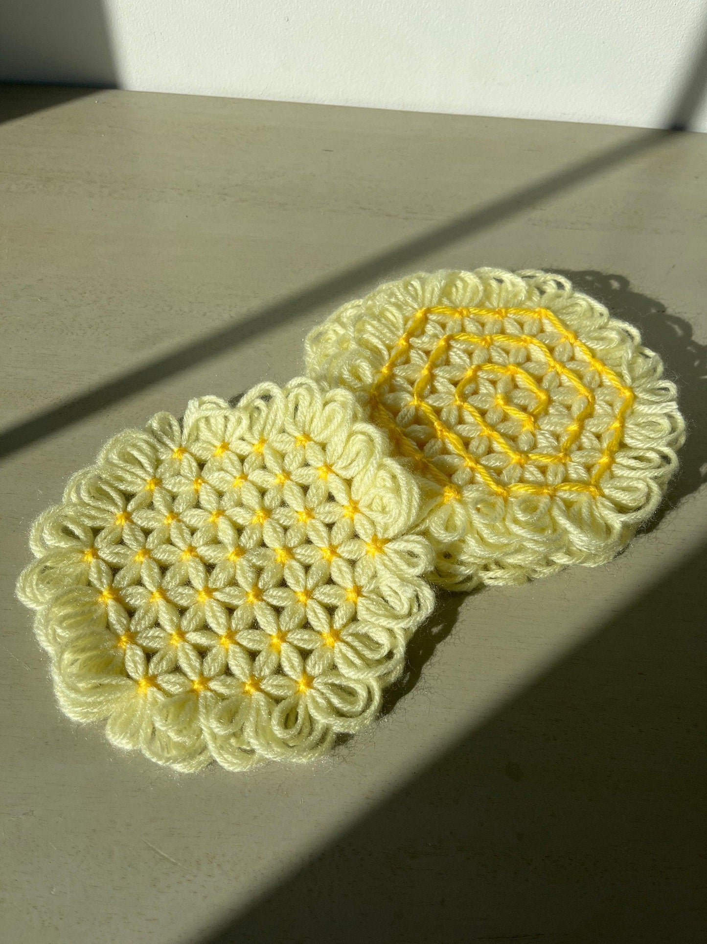 Vintage yellow crocheted coasters