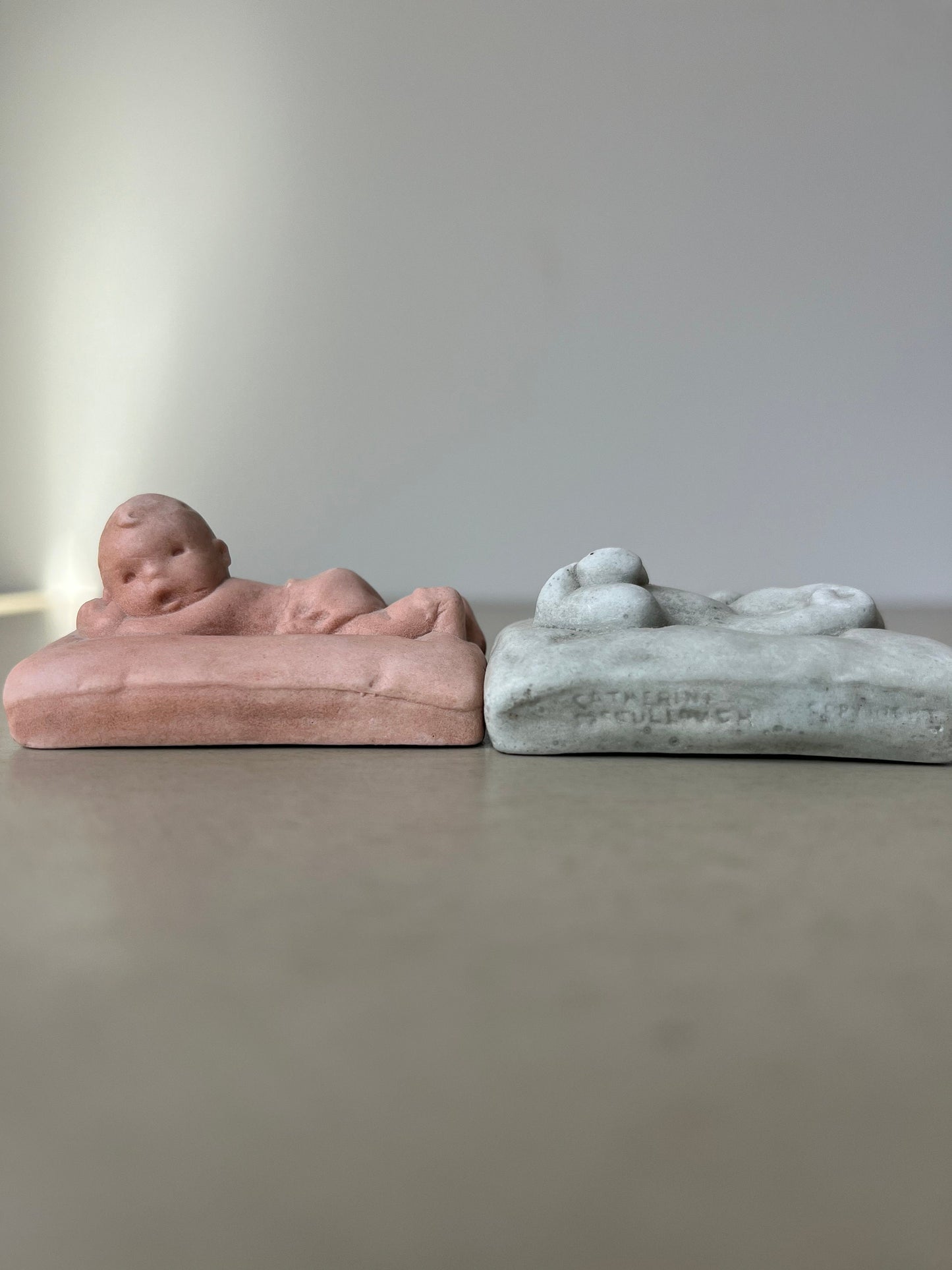 Pair of rare Catherine McCullough 1930 soap stone Kewpie Doll plaques