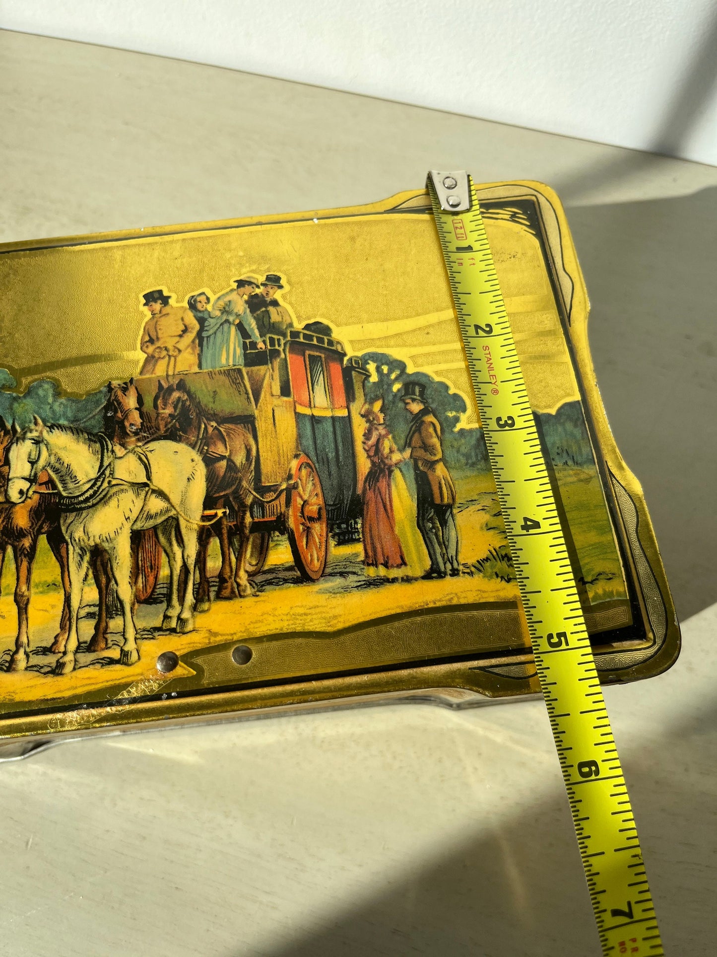 Vintage English biscuits tin with a coaching scene