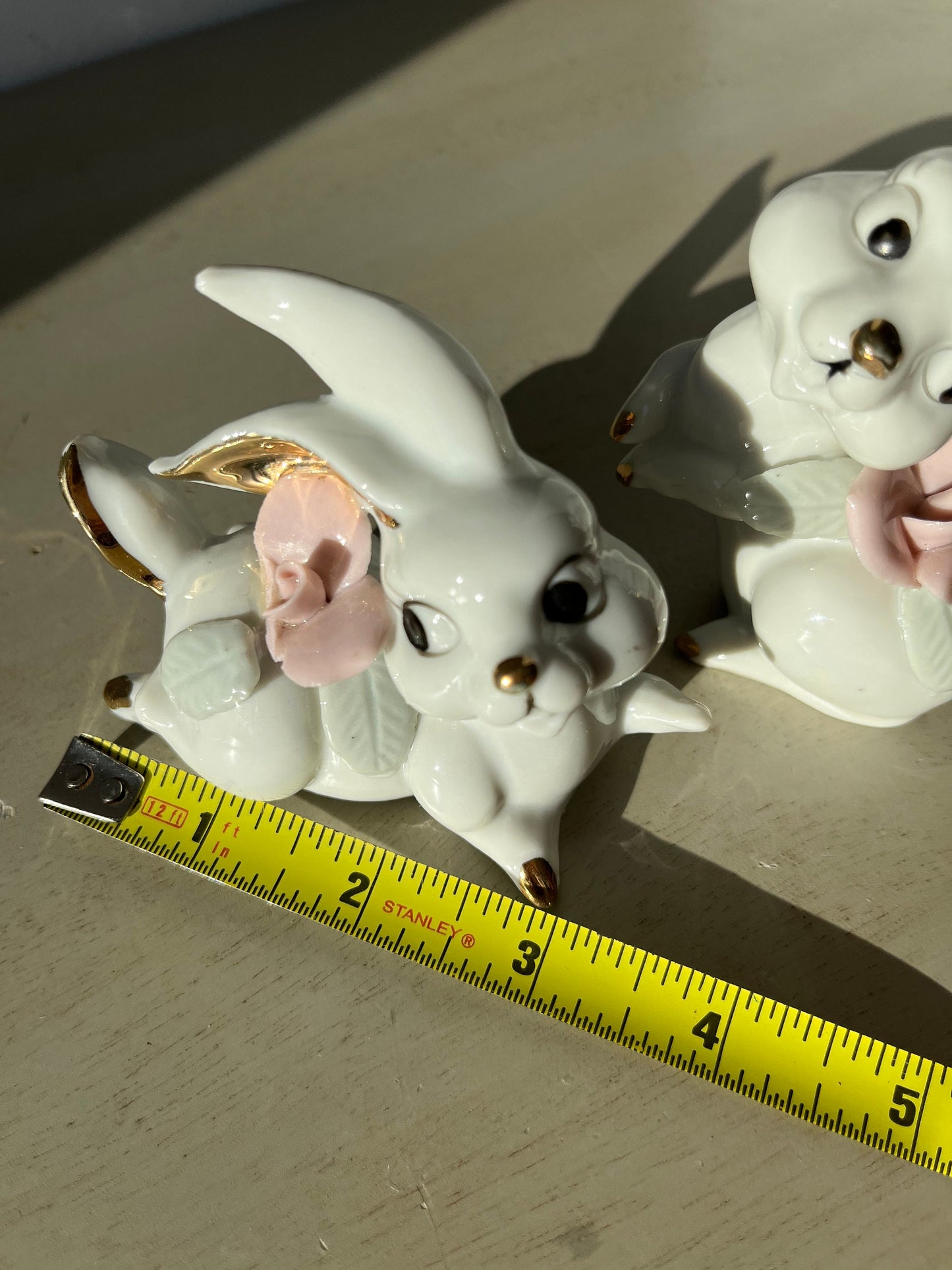 Vintage pair of white porcelain bunny rabbits, pink flowers & gold trim