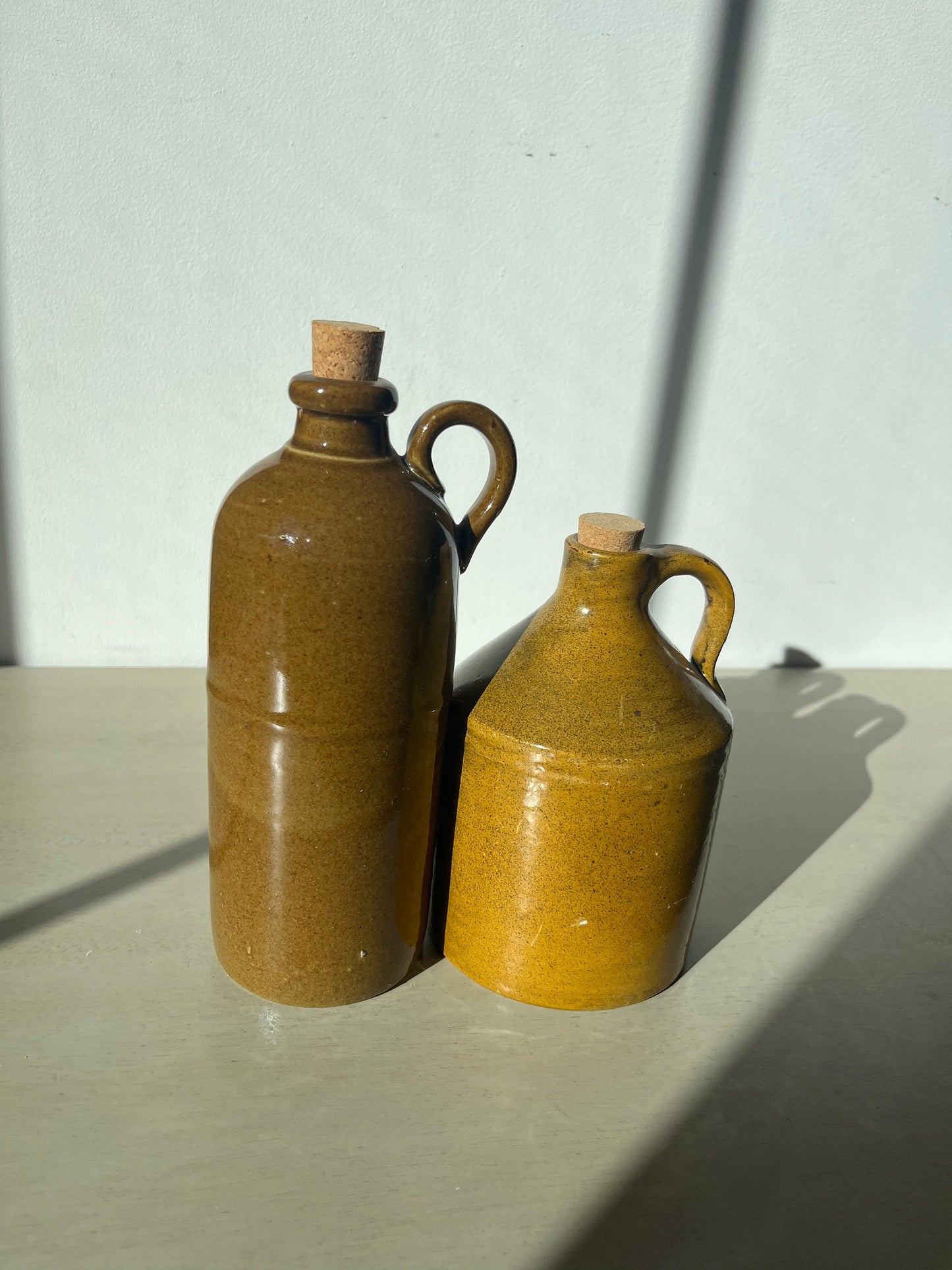 Vintage duo of pottery jugs