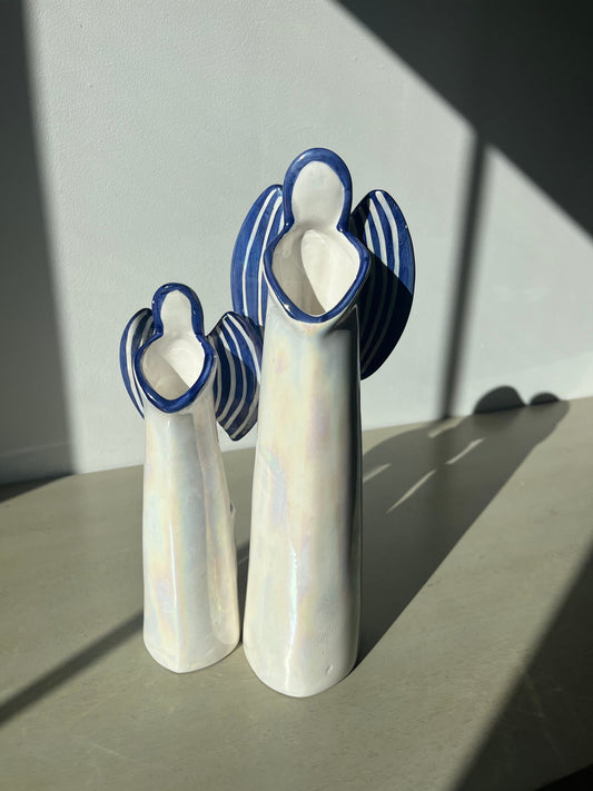 Pair of vintage iridescent glass blue pearl 12 & 9.5 inch angel candle holders