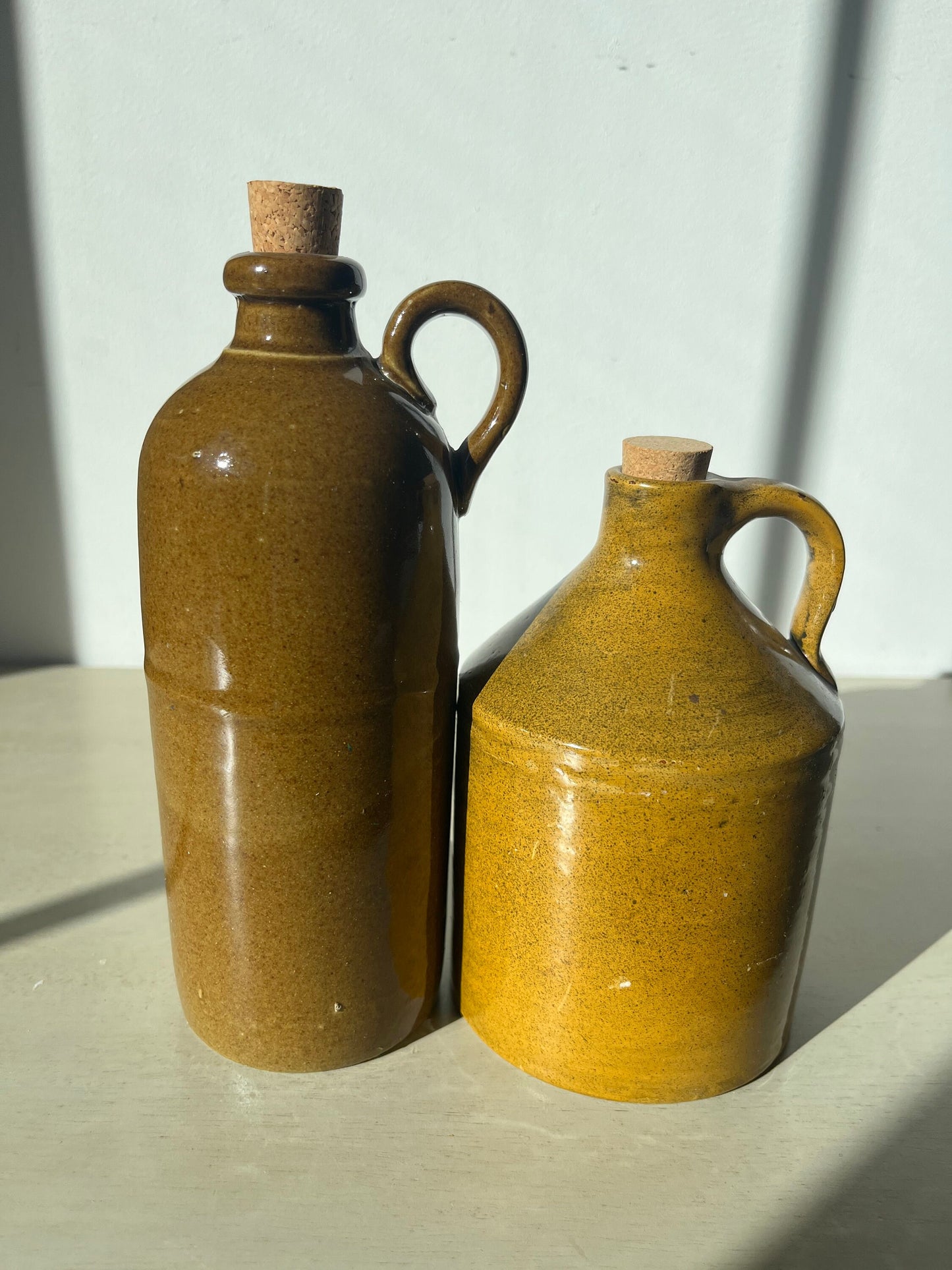 Vintage duo of pottery jugs