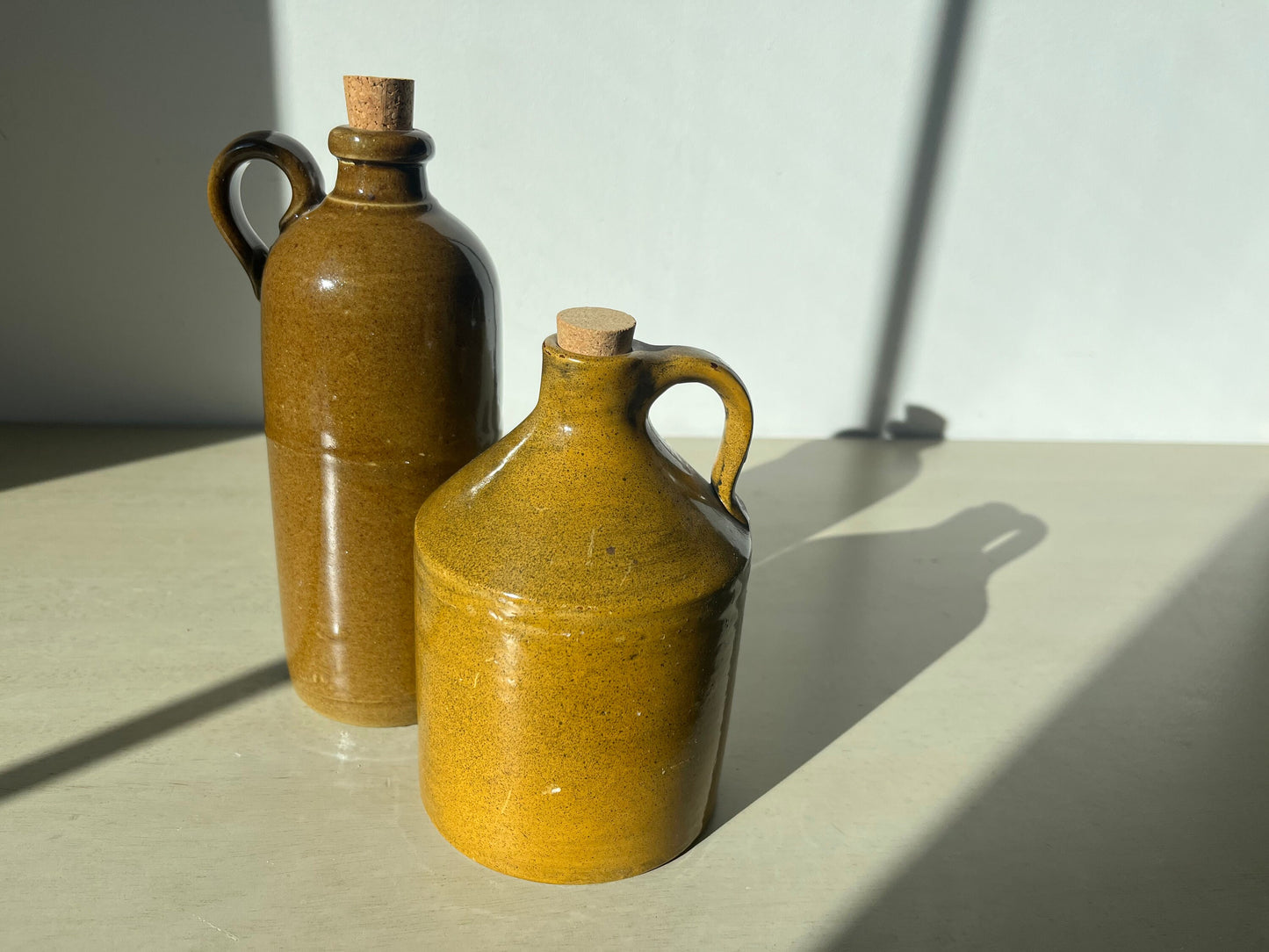 Vintage duo of pottery jugs