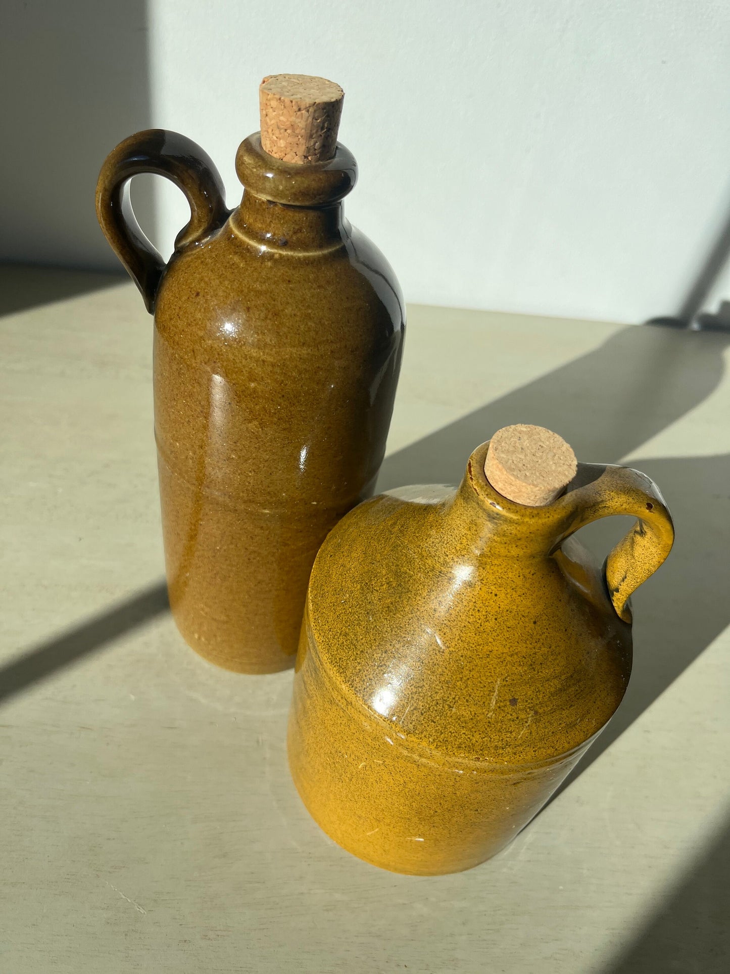 Vintage duo of pottery jugs