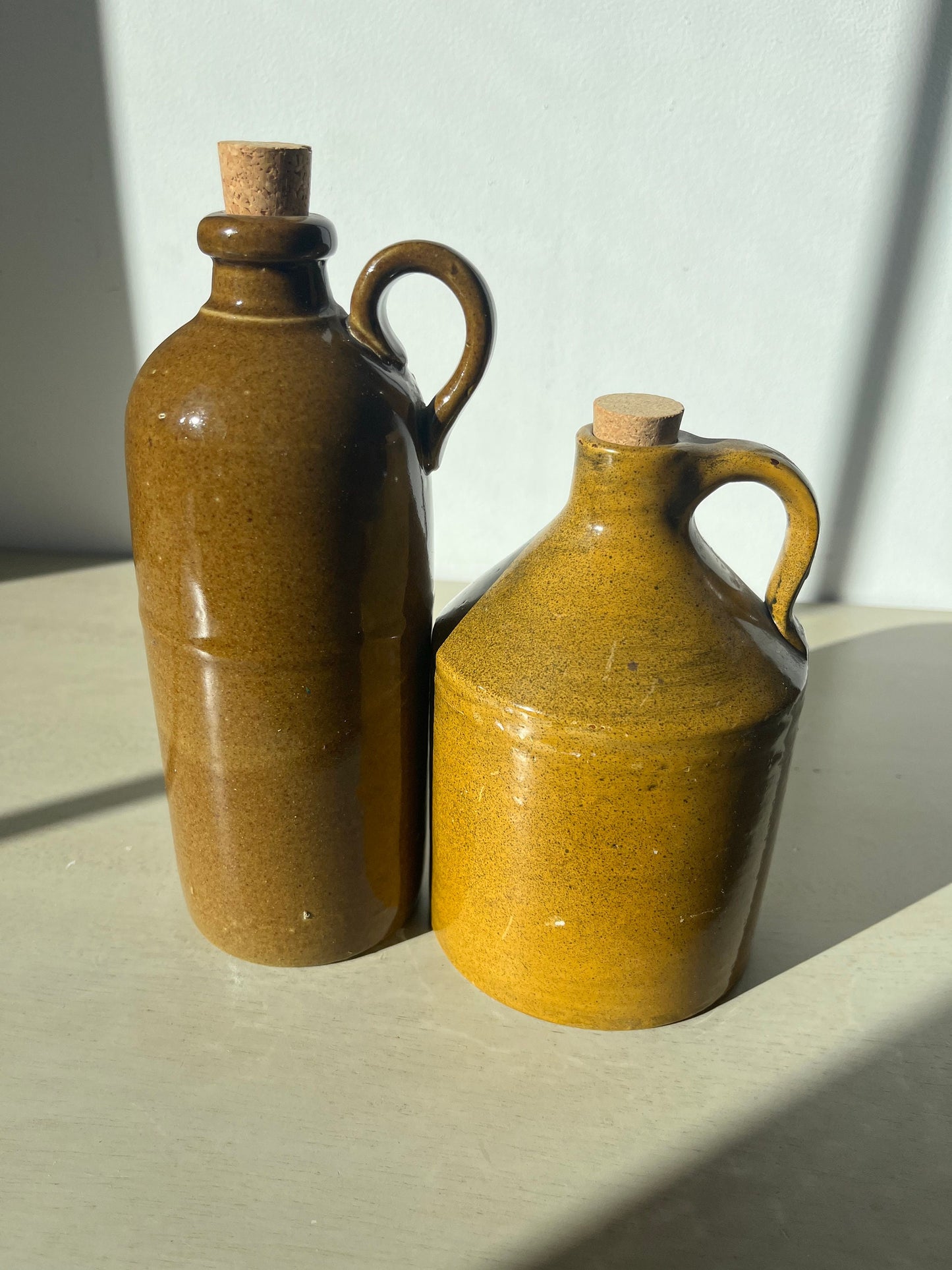 Vintage duo of pottery jugs