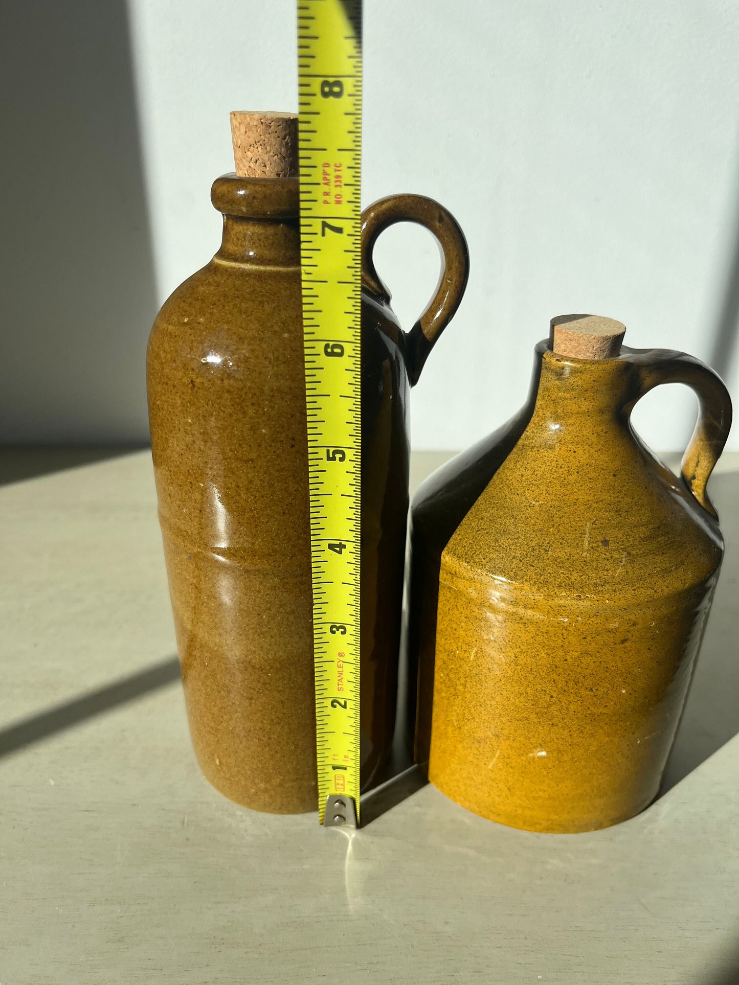 Vintage duo of pottery jugs