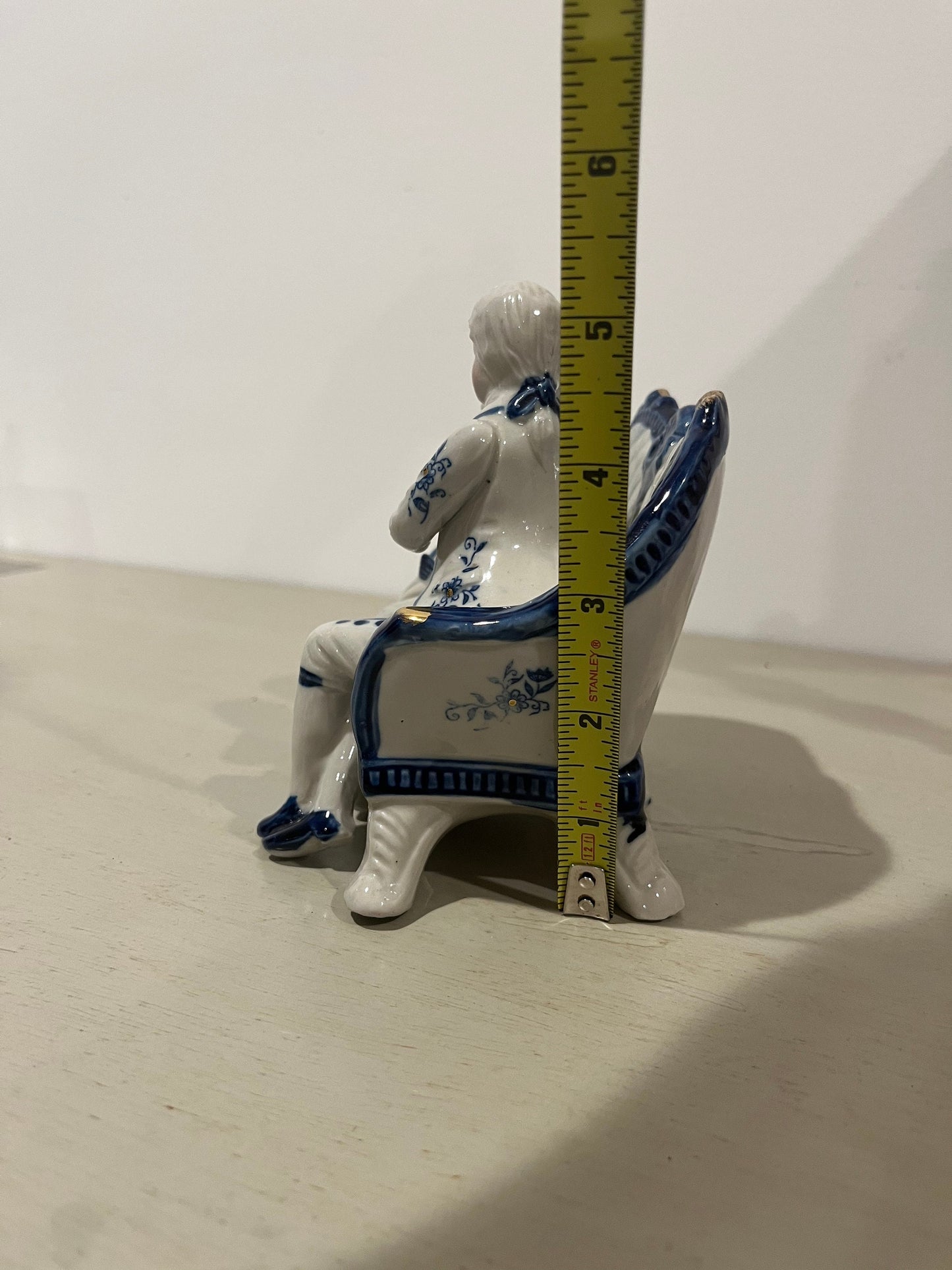 Vintage porcelain blue and white figurine of a courting 18th century couple