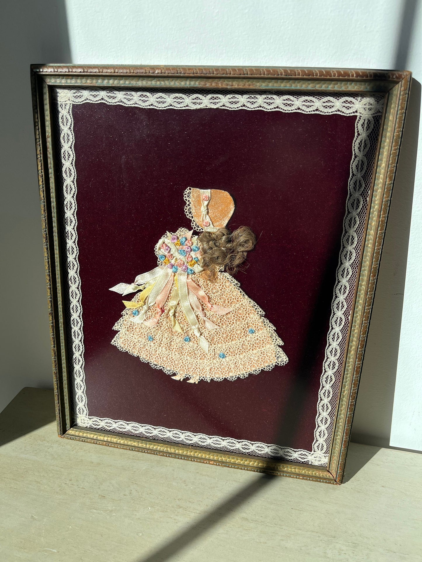 1930s paper and fabric framed doll