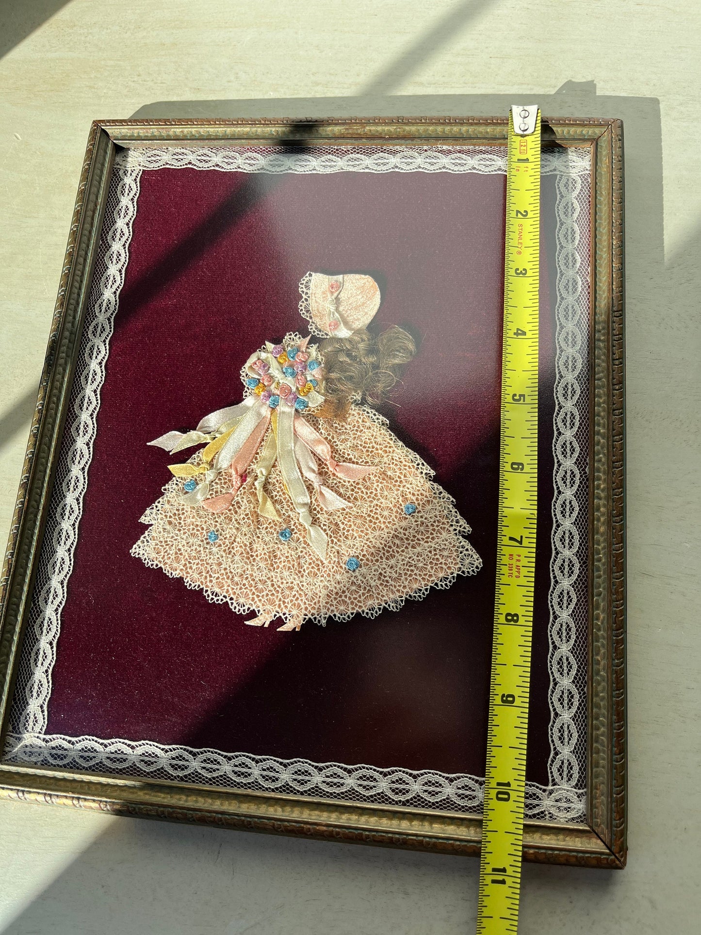 1930s paper and fabric framed doll