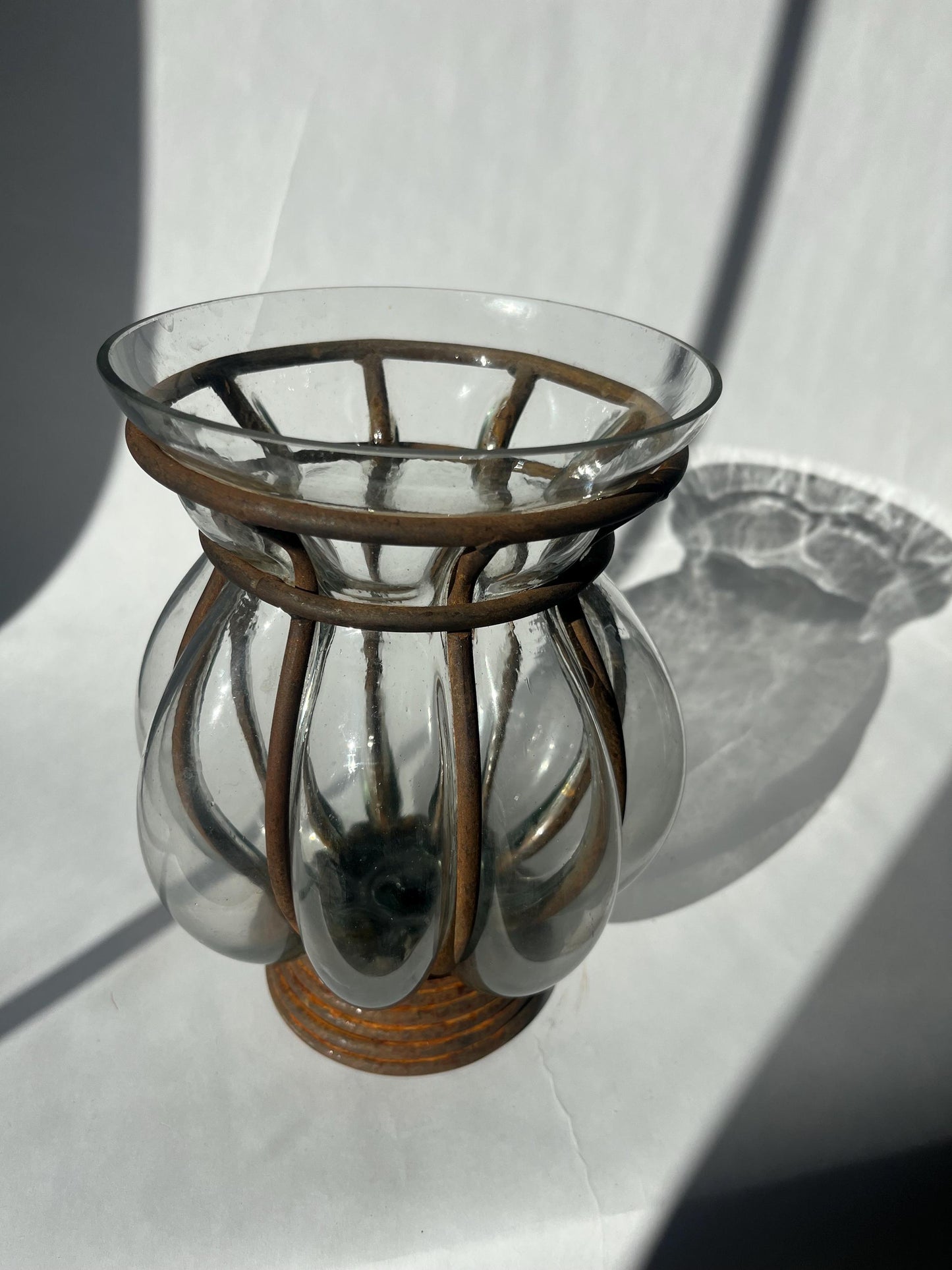 Vintage hand-blown glass caged vase or candle holder in metal frame
