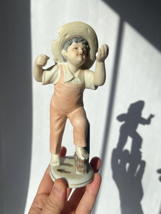 Vintage ceramic figurine of a boy, made in Japan