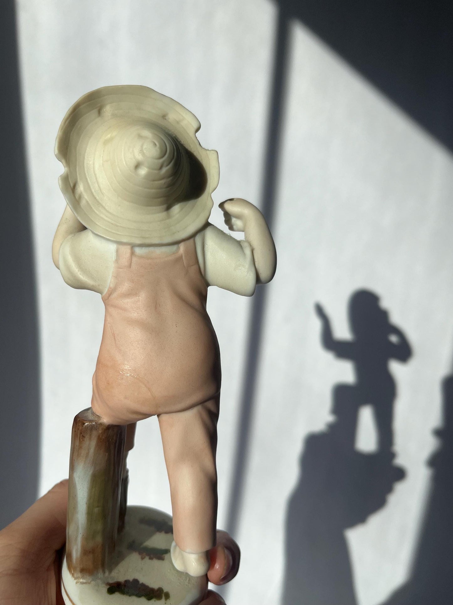 Vintage ceramic figurine of a boy, made in Japan
