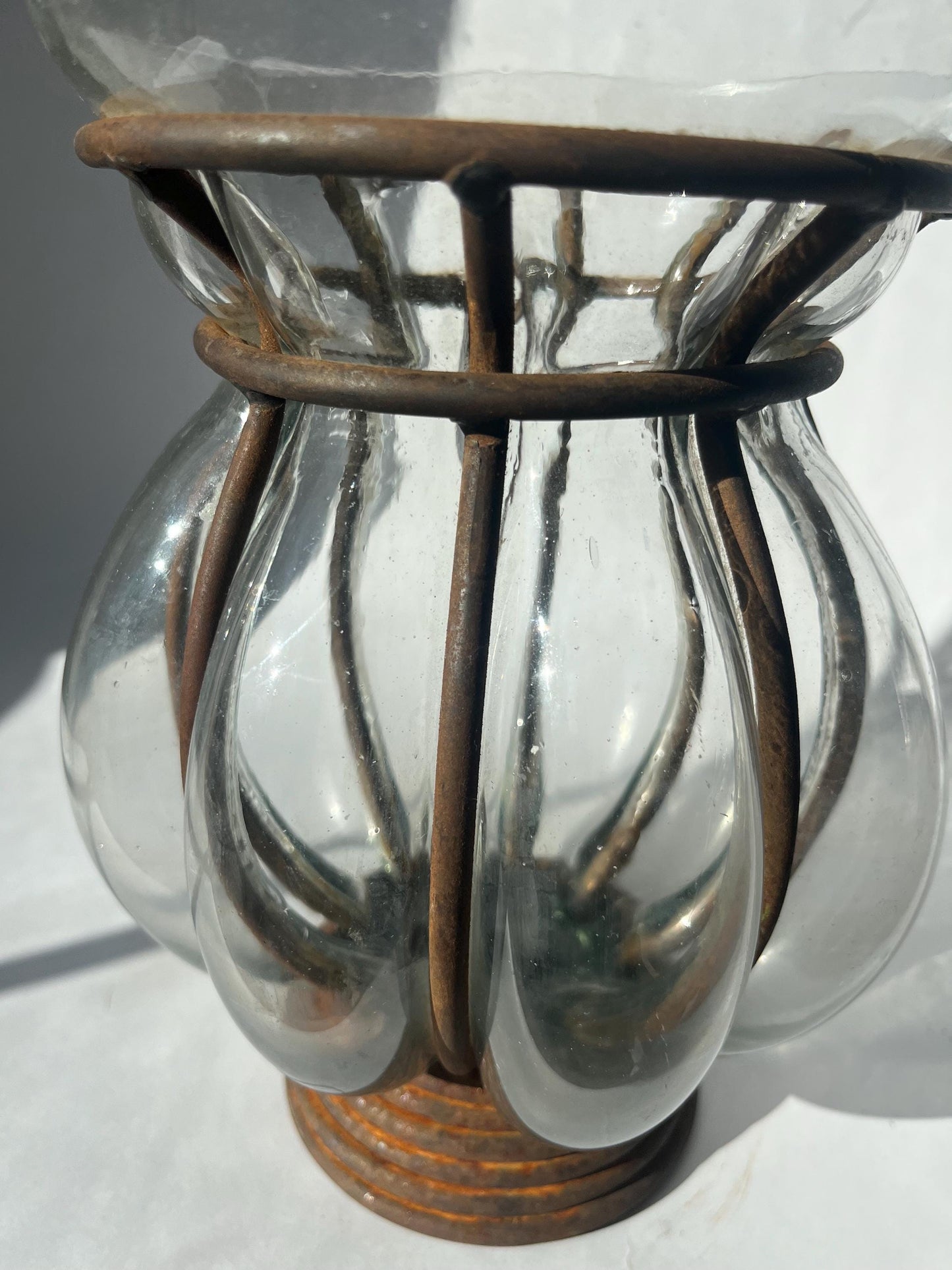 Vintage hand-blown glass caged vase or candle holder in metal frame