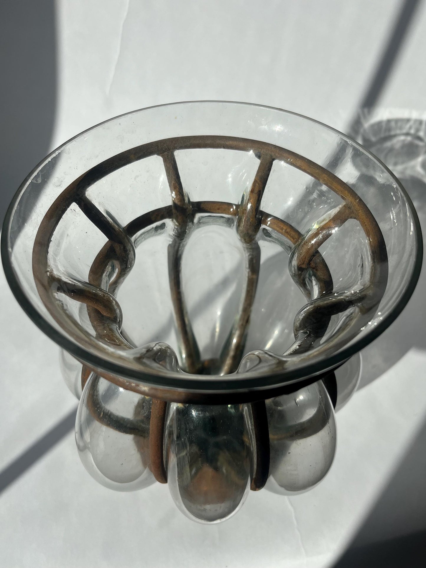 Vintage hand-blown glass caged vase or candle holder in metal frame