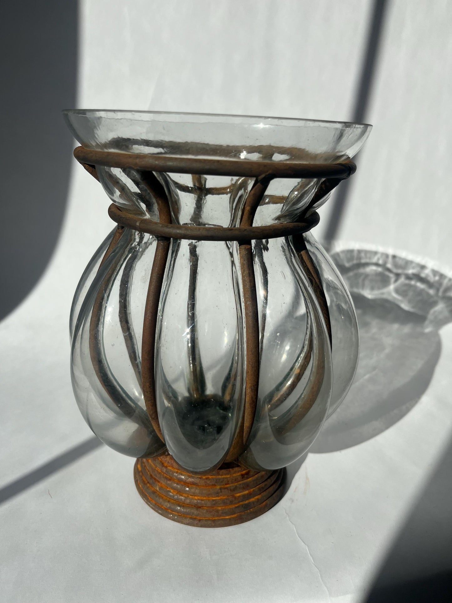 Vintage hand-blown glass caged vase or candle holder in metal frame