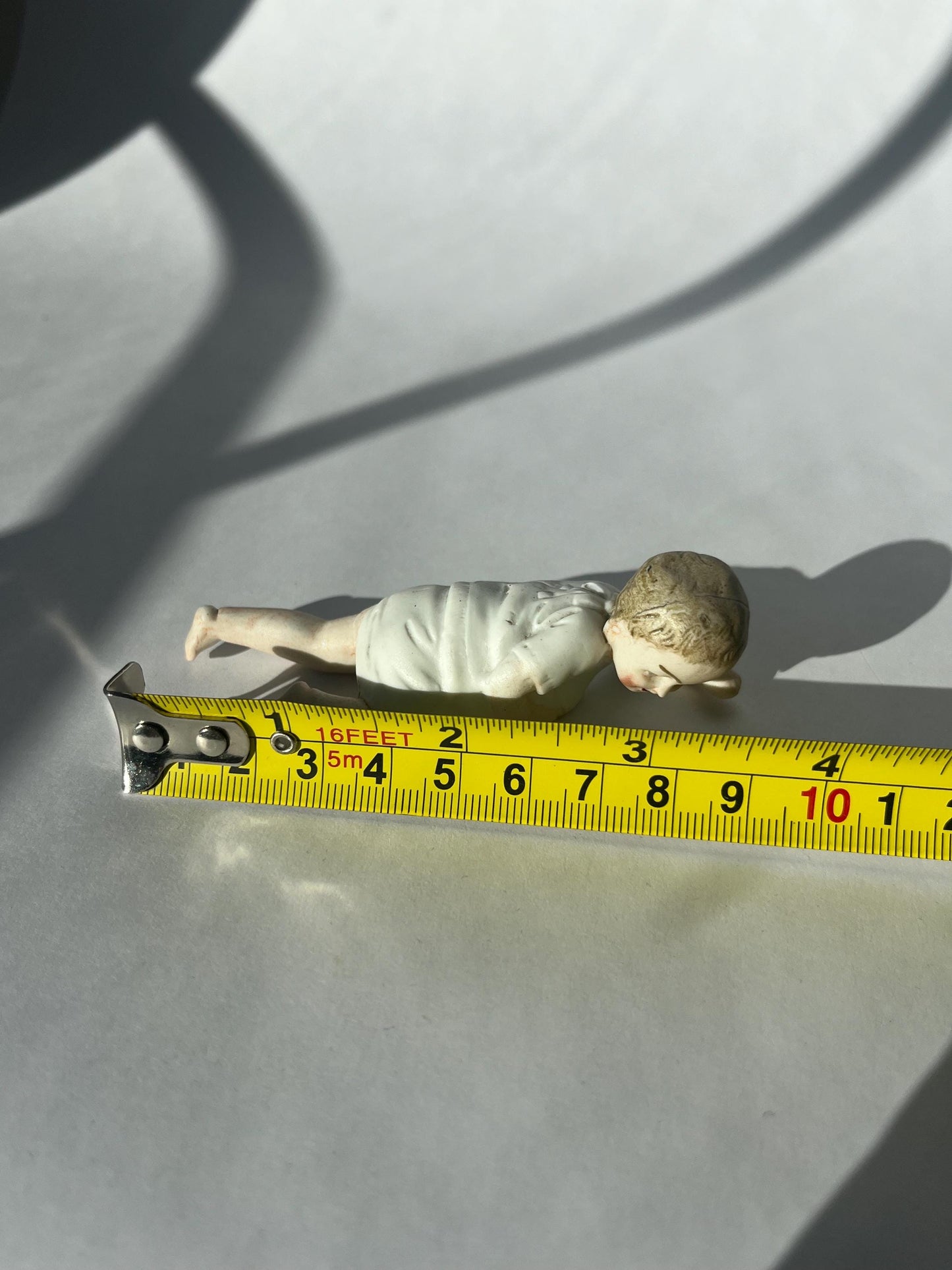 Vintage Porcelain Piano Baby Figurine 3.5 inches long