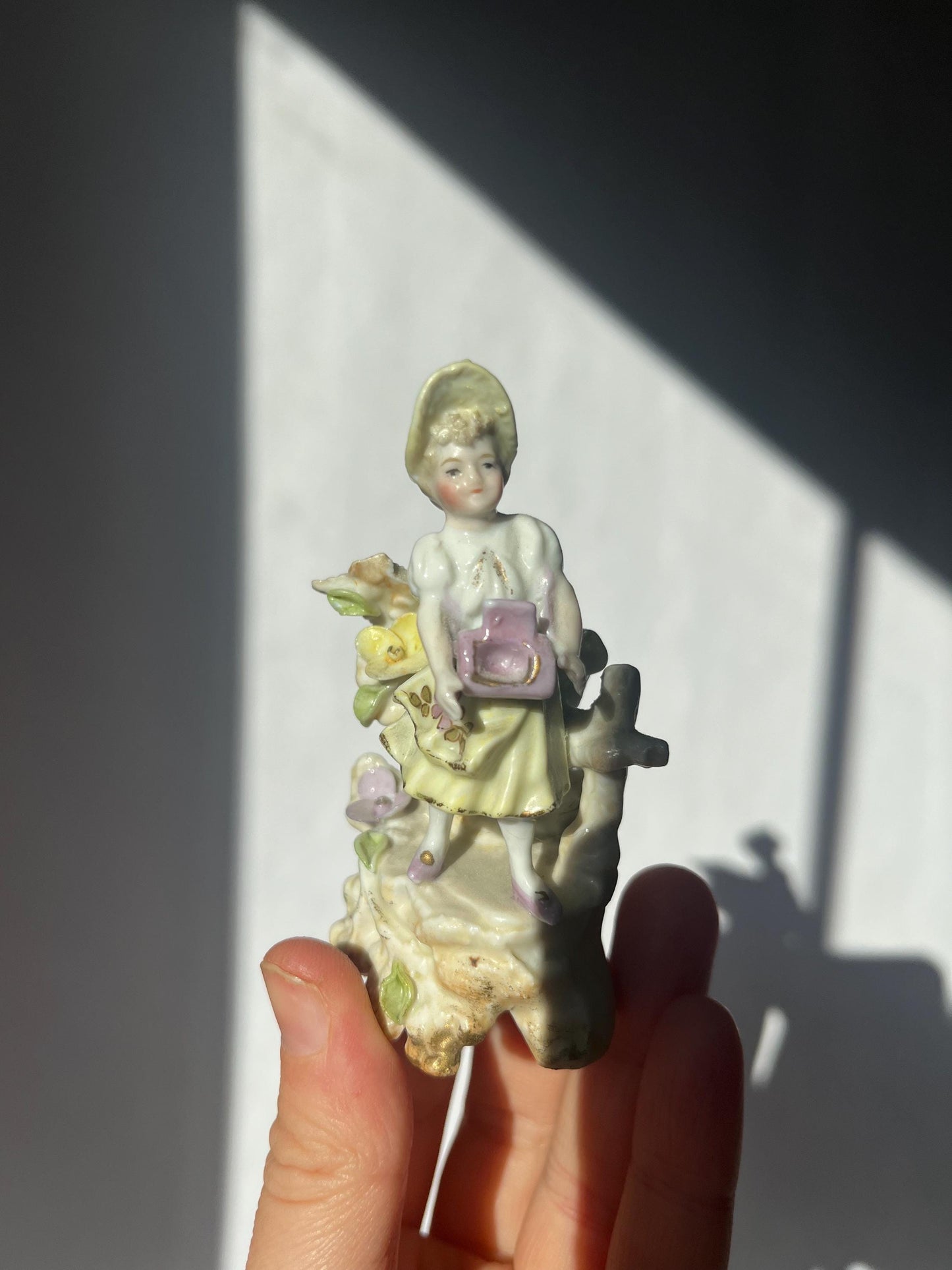 Antique mini porcelain figurine