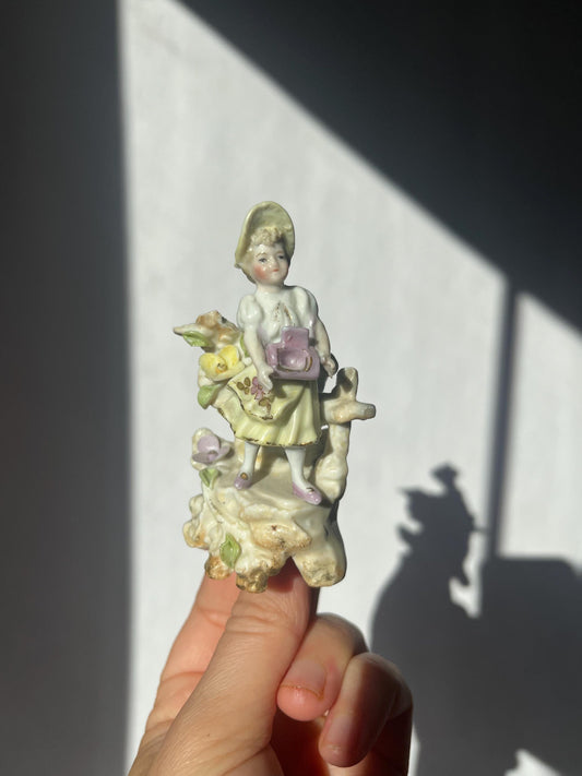 Antique mini porcelain figurine