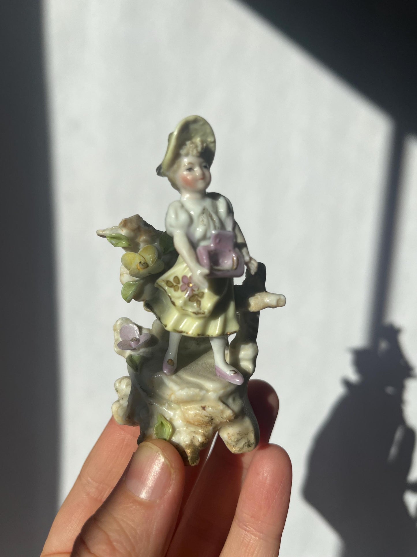 Antique mini porcelain figurine