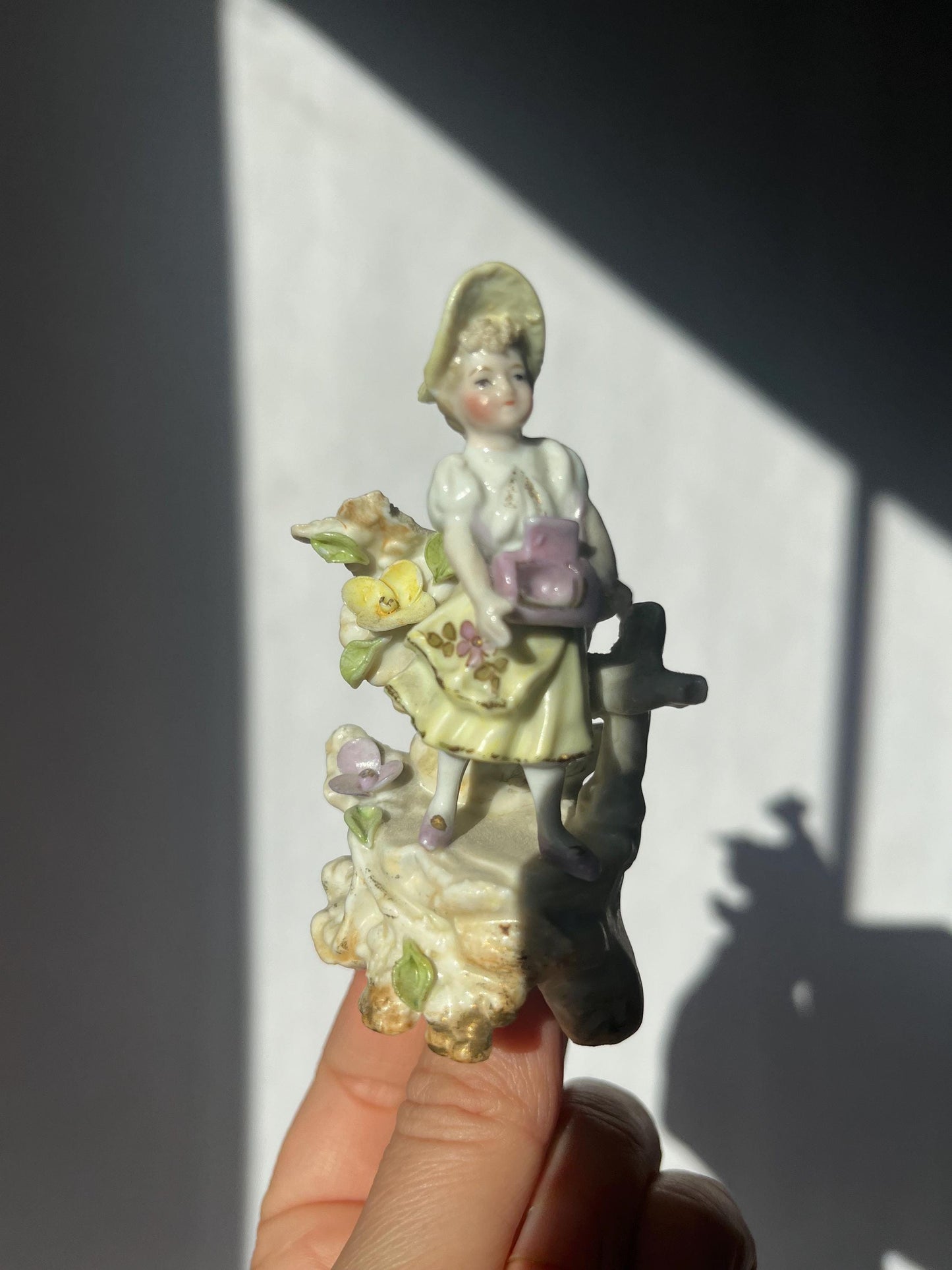 Antique mini porcelain figurine