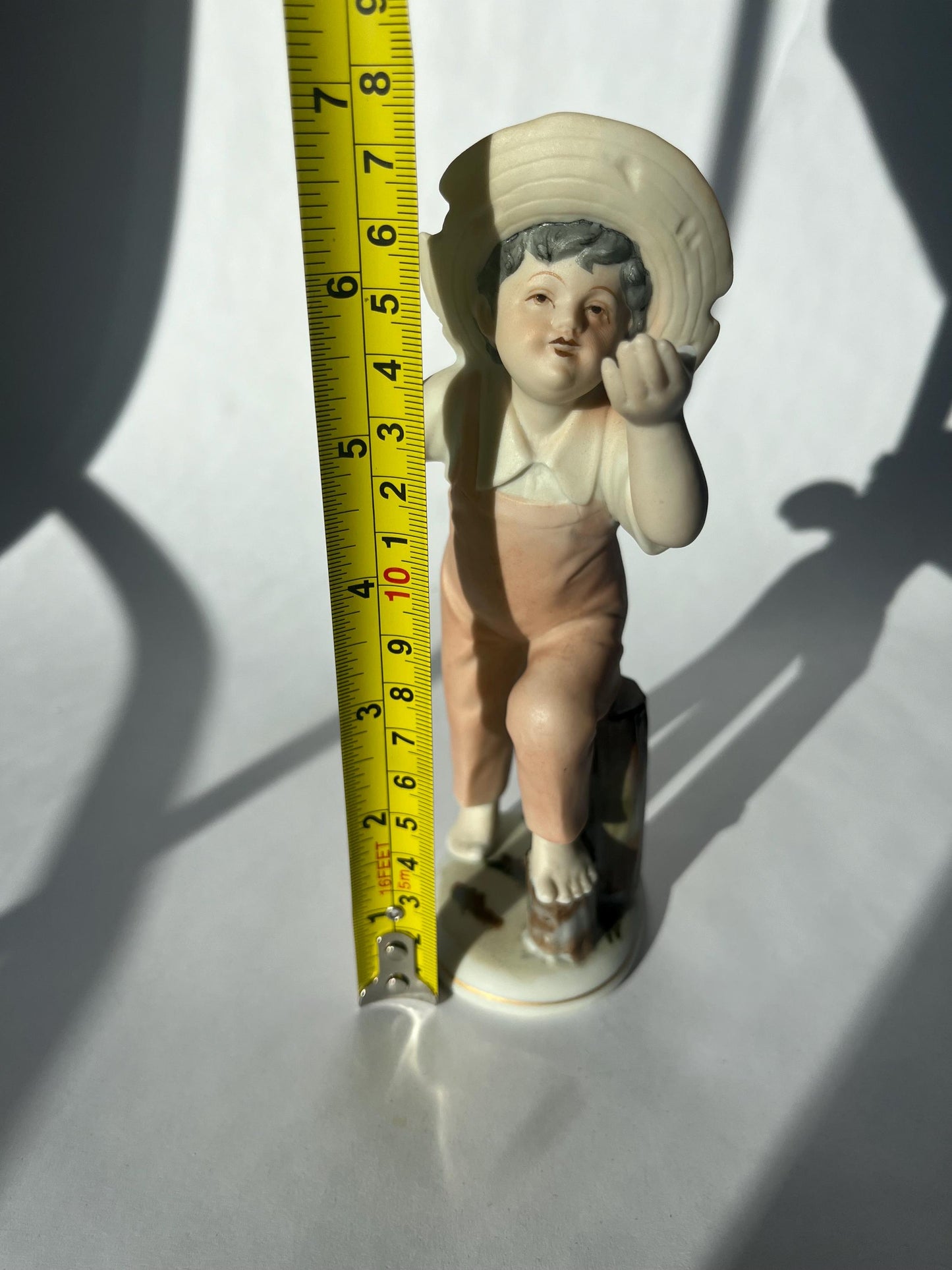 Vintage ceramic figurine of a boy, made in Japan