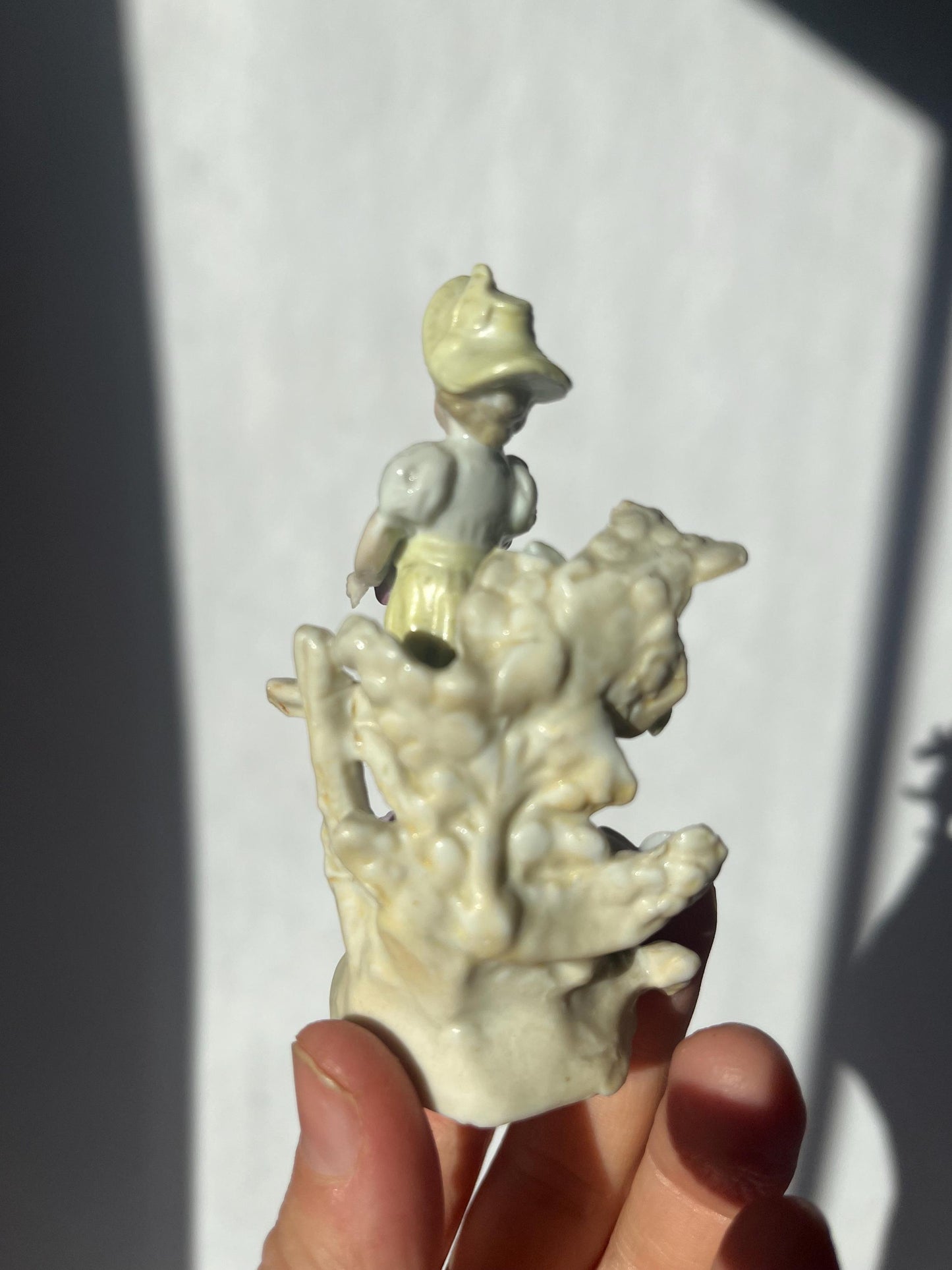 Antique mini porcelain figurine