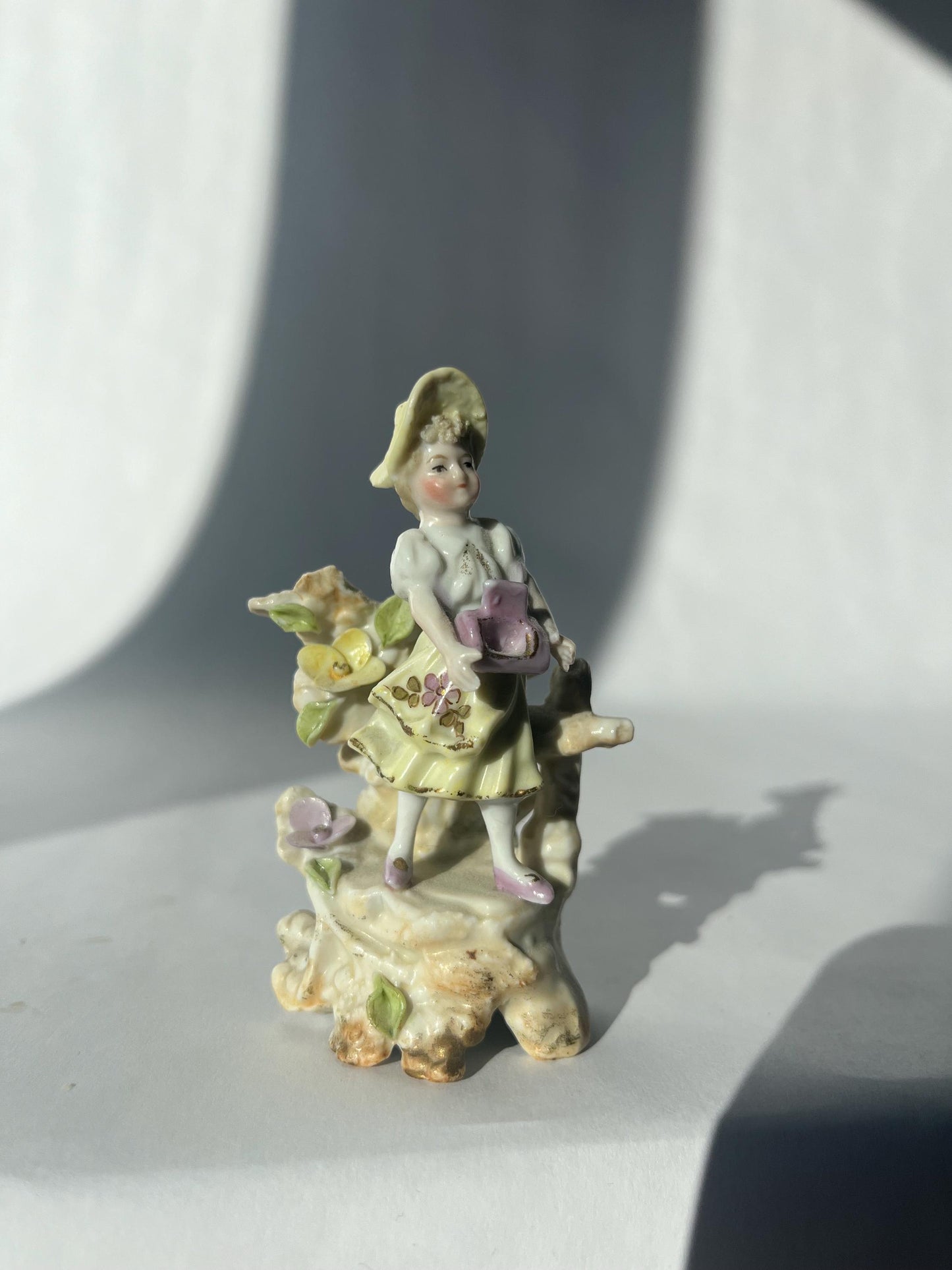 Antique mini porcelain figurine