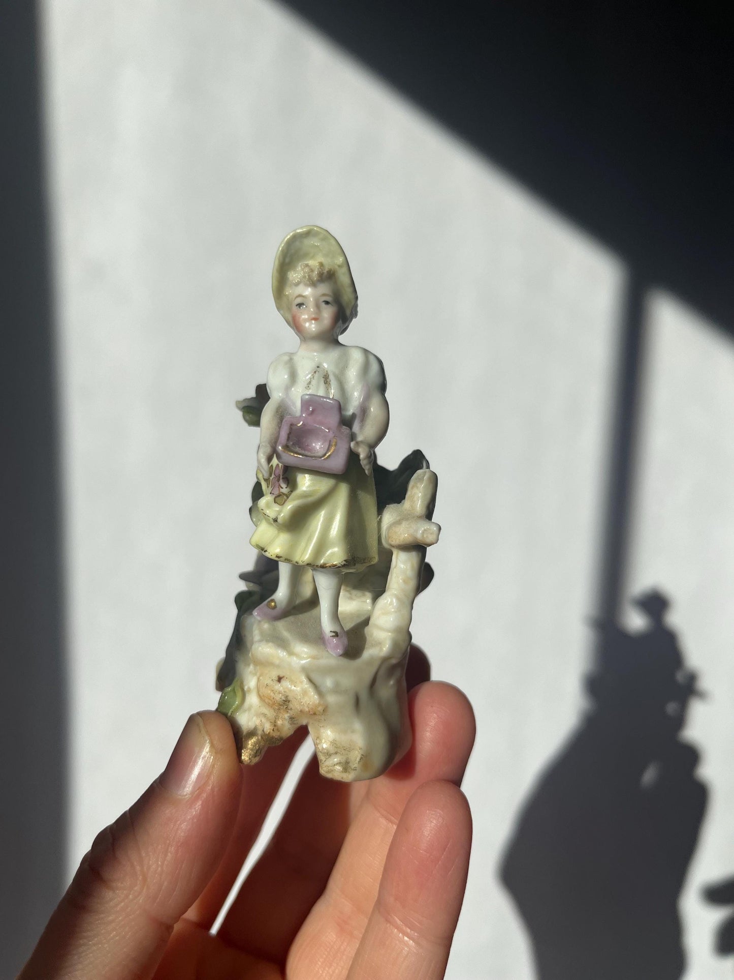 Antique mini porcelain figurine