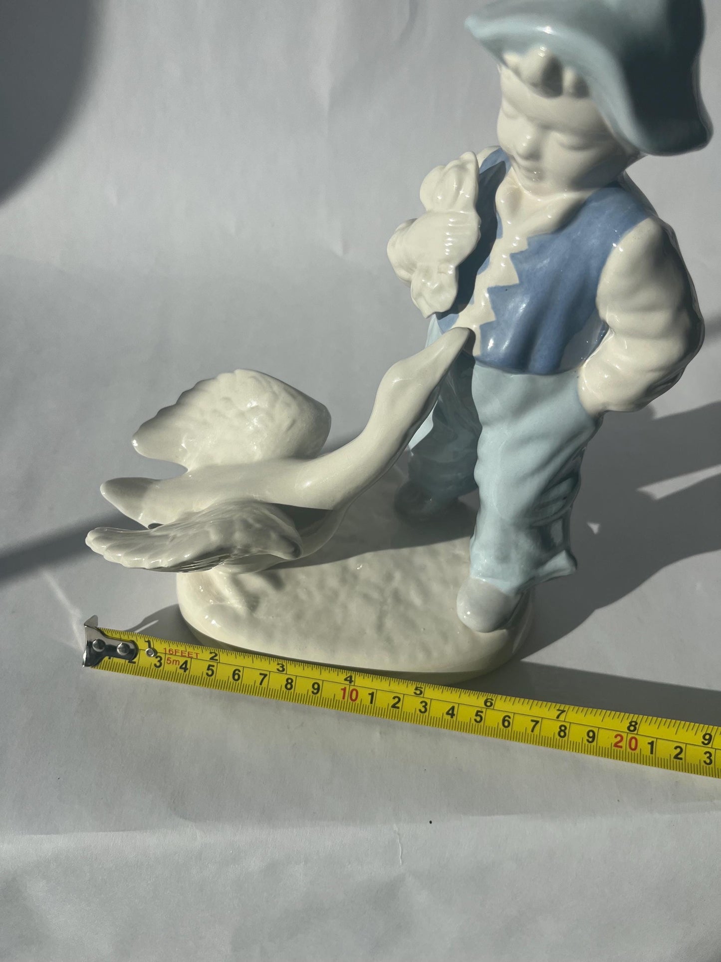 Vintage Porcelain Hand Painted Figurine of a Boy with a Goose