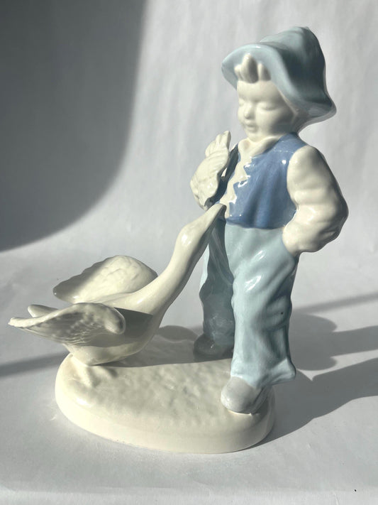 Vintage Porcelain Hand Painted Figurine of a Boy with a Goose