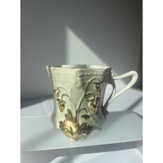 Antique hand painted porcelain cup