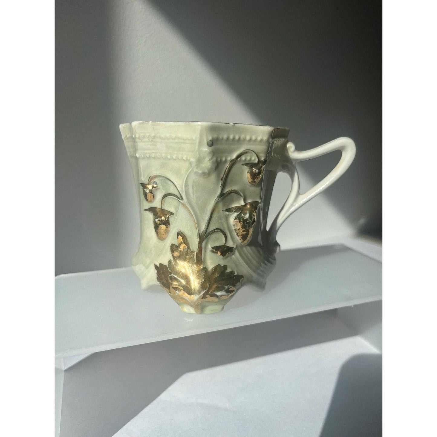 Antique hand painted porcelain cup