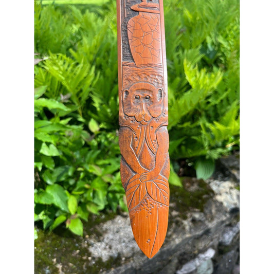 Early 1900s Asian carved wood page turner