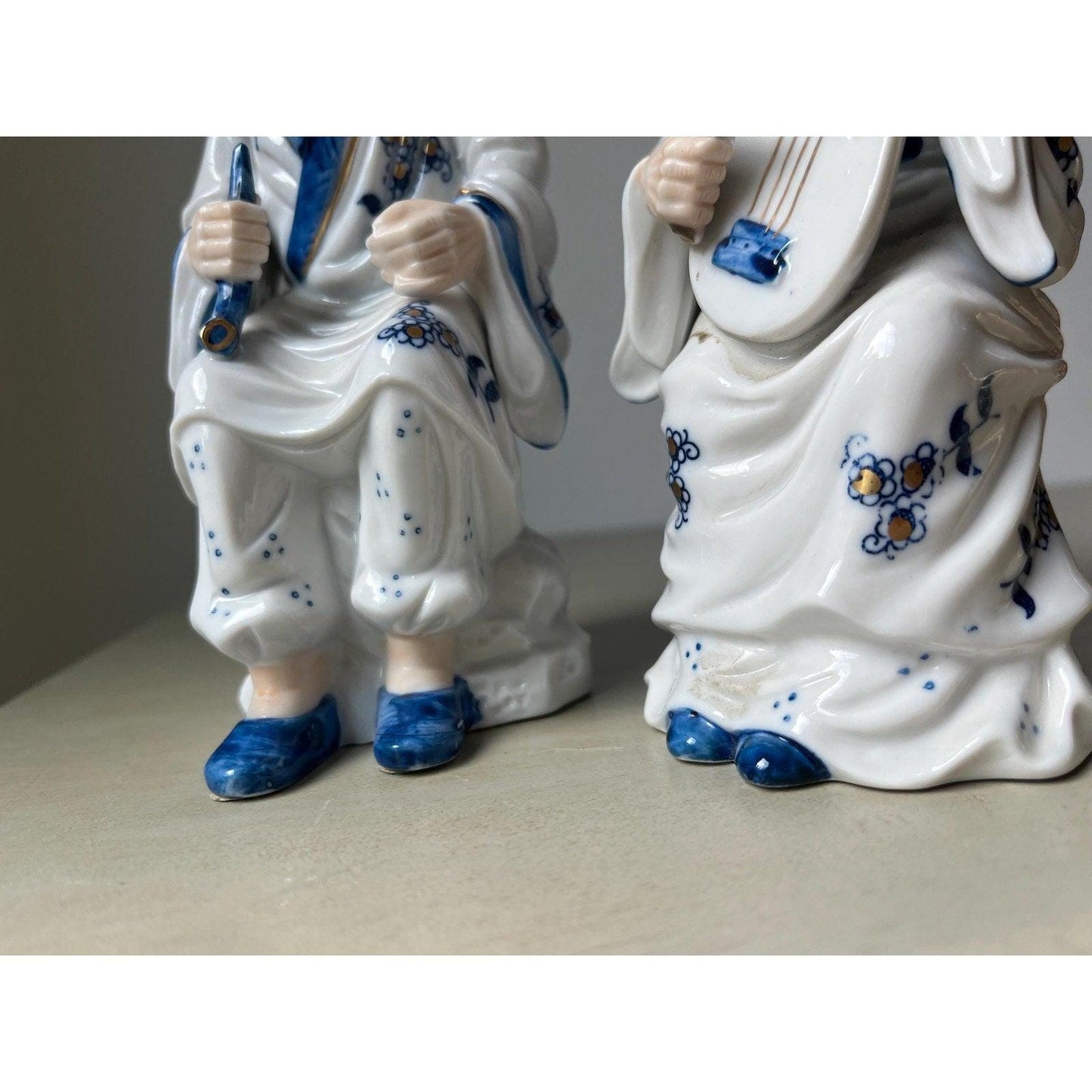 Pair of vintage porcelain Japanese musician figurines