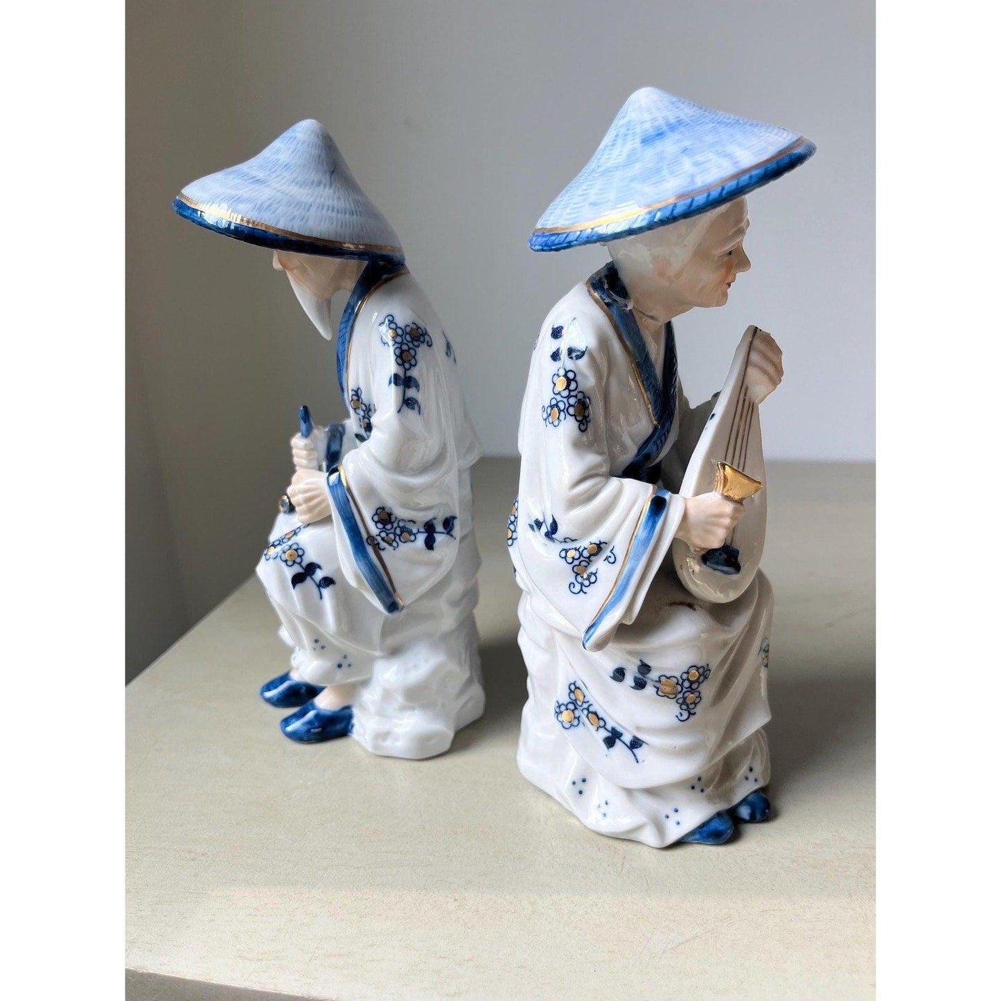 Pair of vintage porcelain Japanese musician figurines