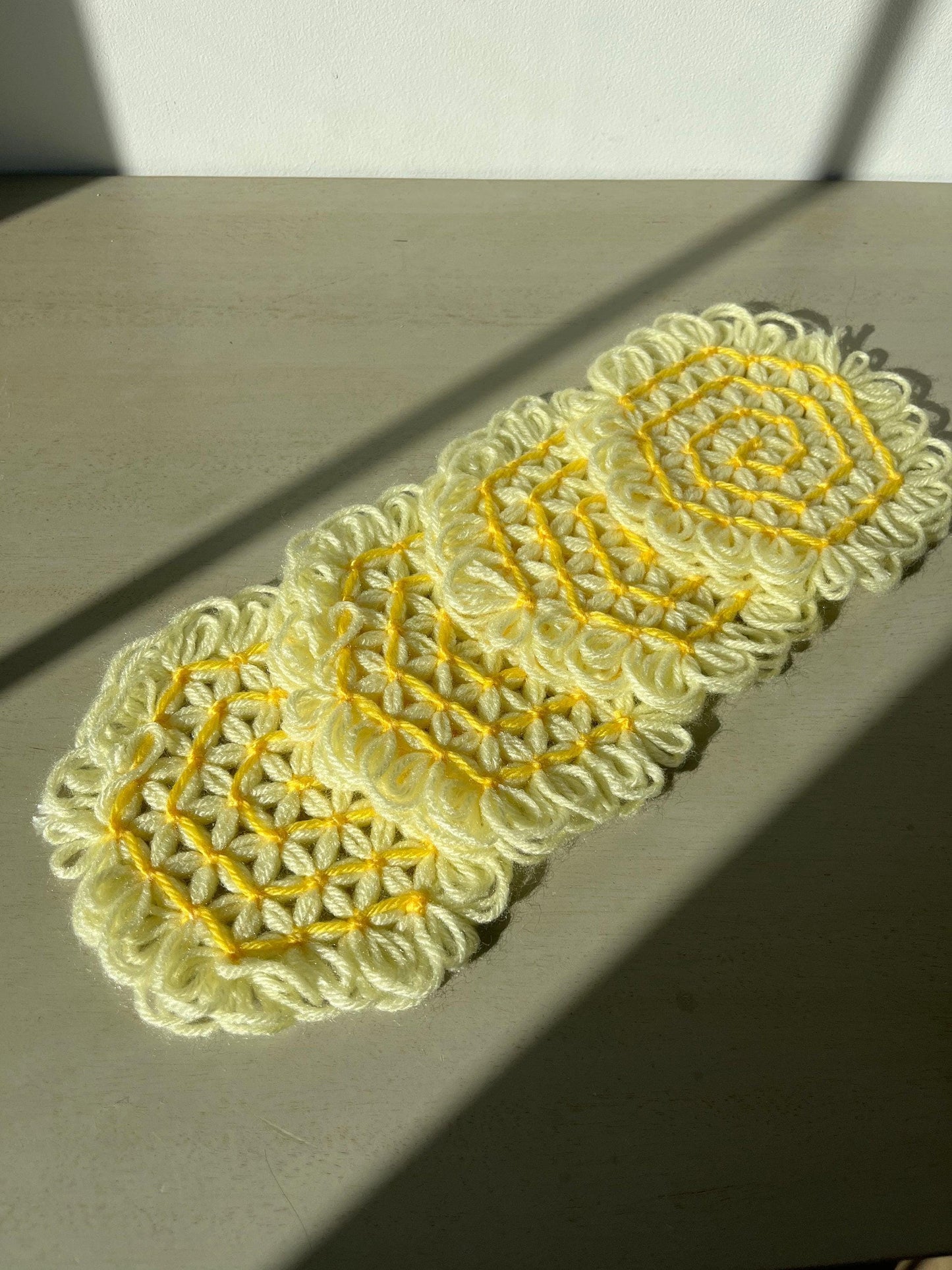 Vintage yellow crocheted coasters