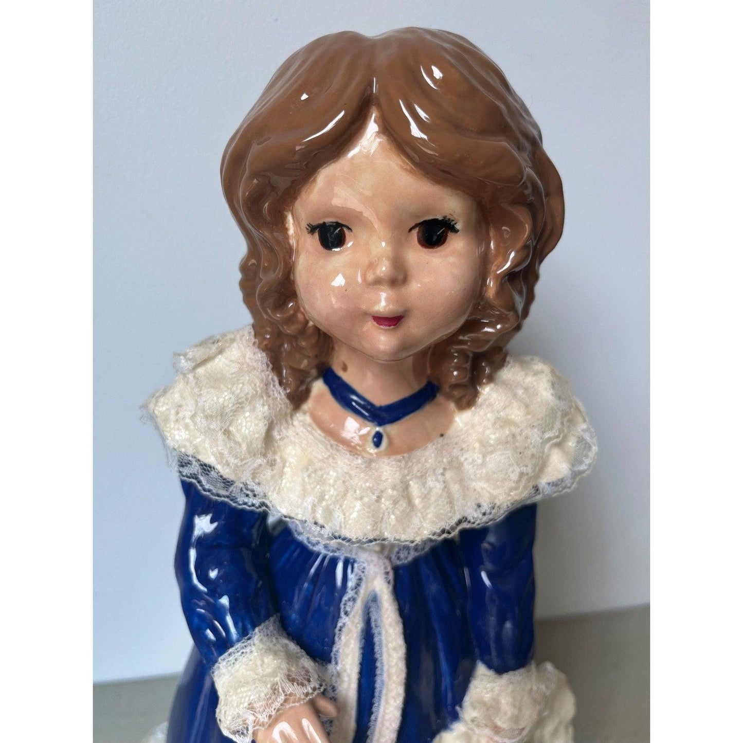 Vintage 14" ceramic figurine of a girl with a hat