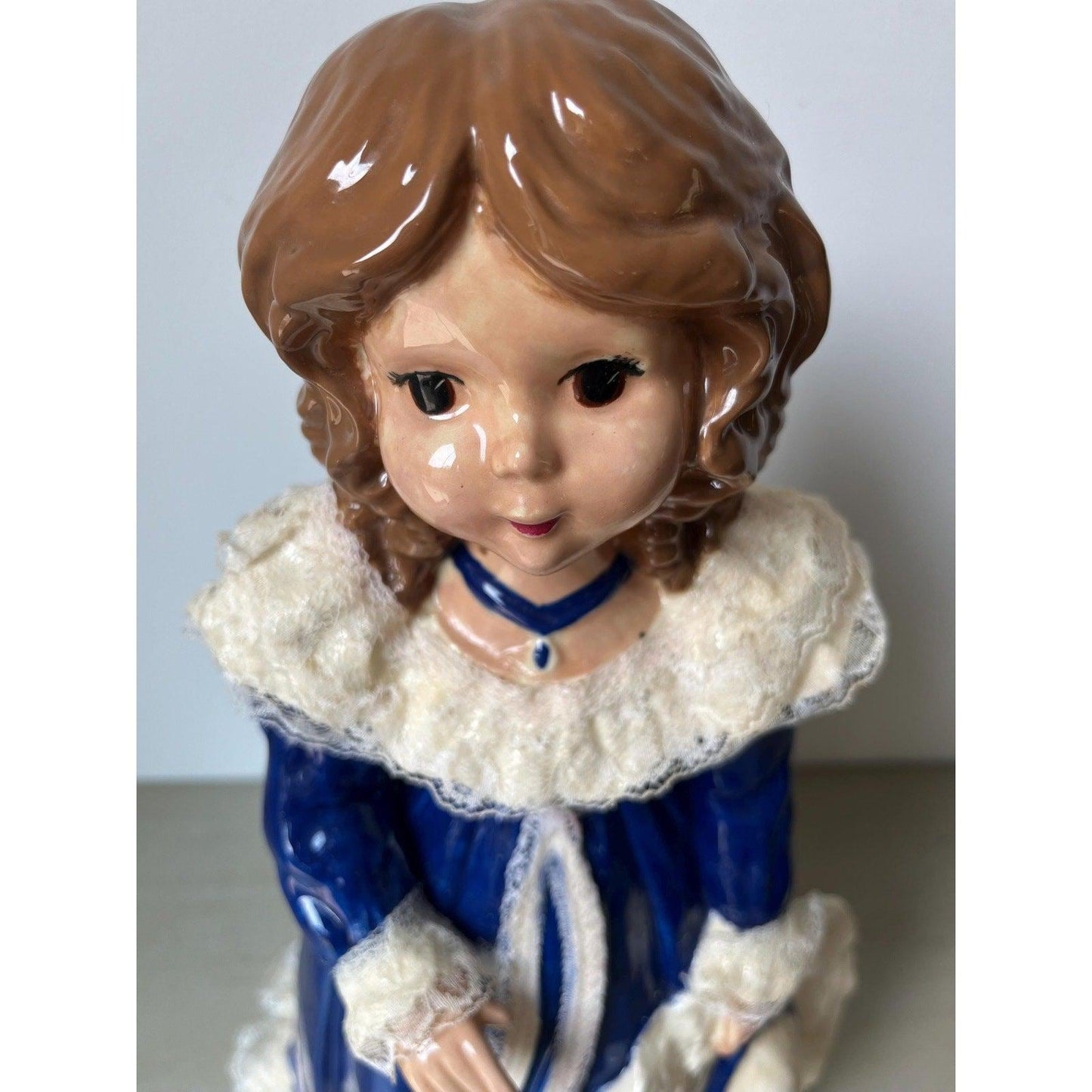 Vintage 14" ceramic figurine of a girl with a hat