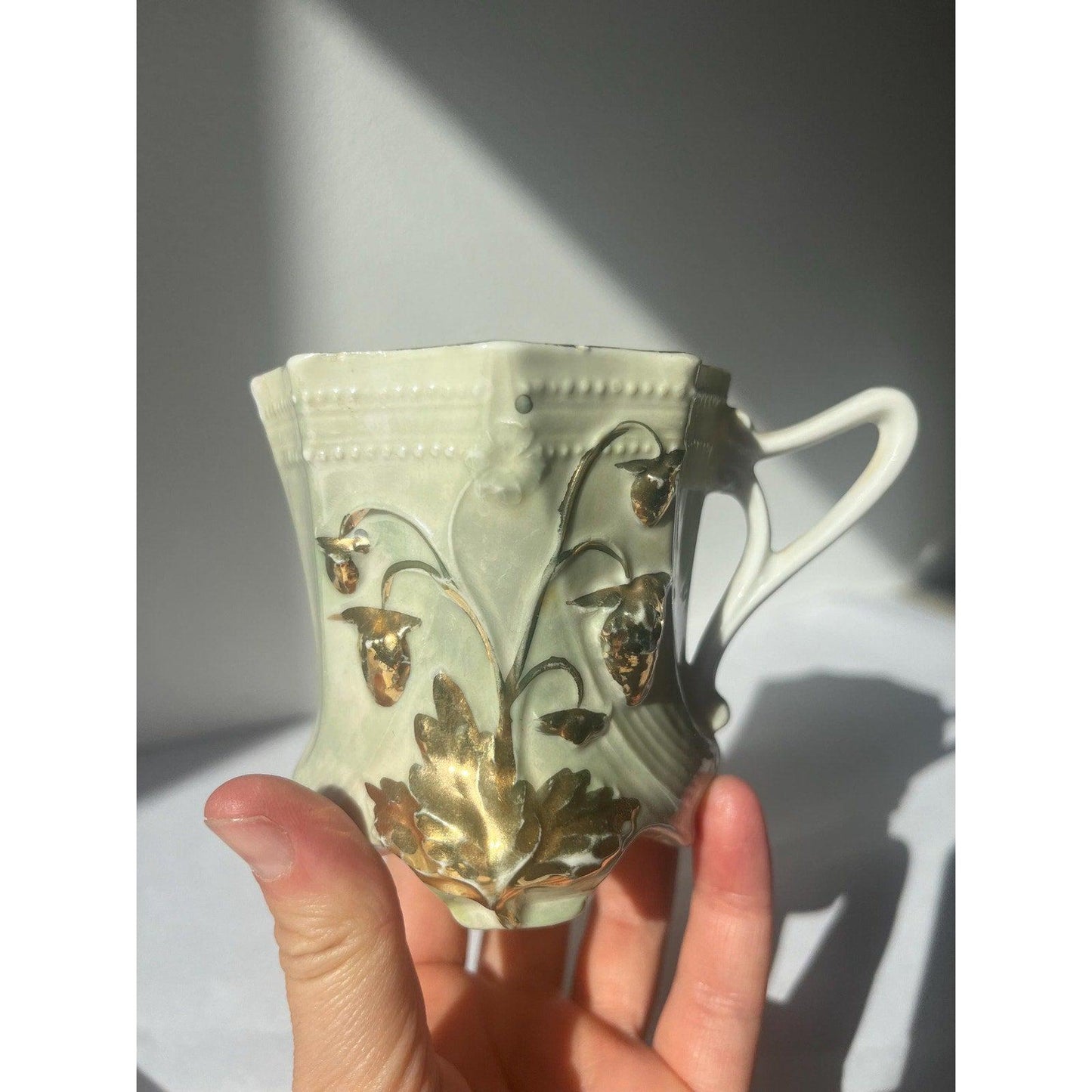Antique hand painted porcelain cup